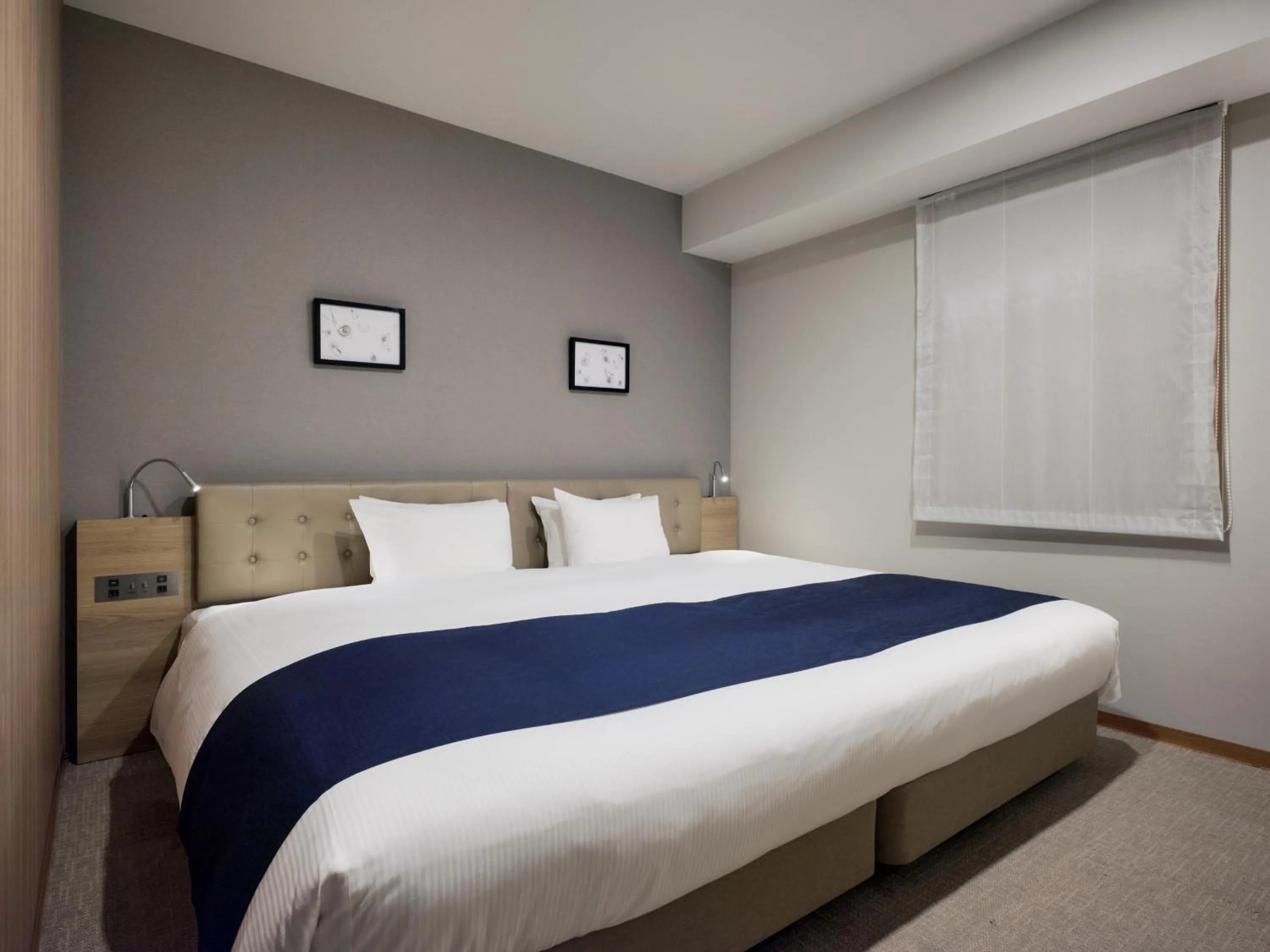 Bed in hotel MONday Haneda Airport