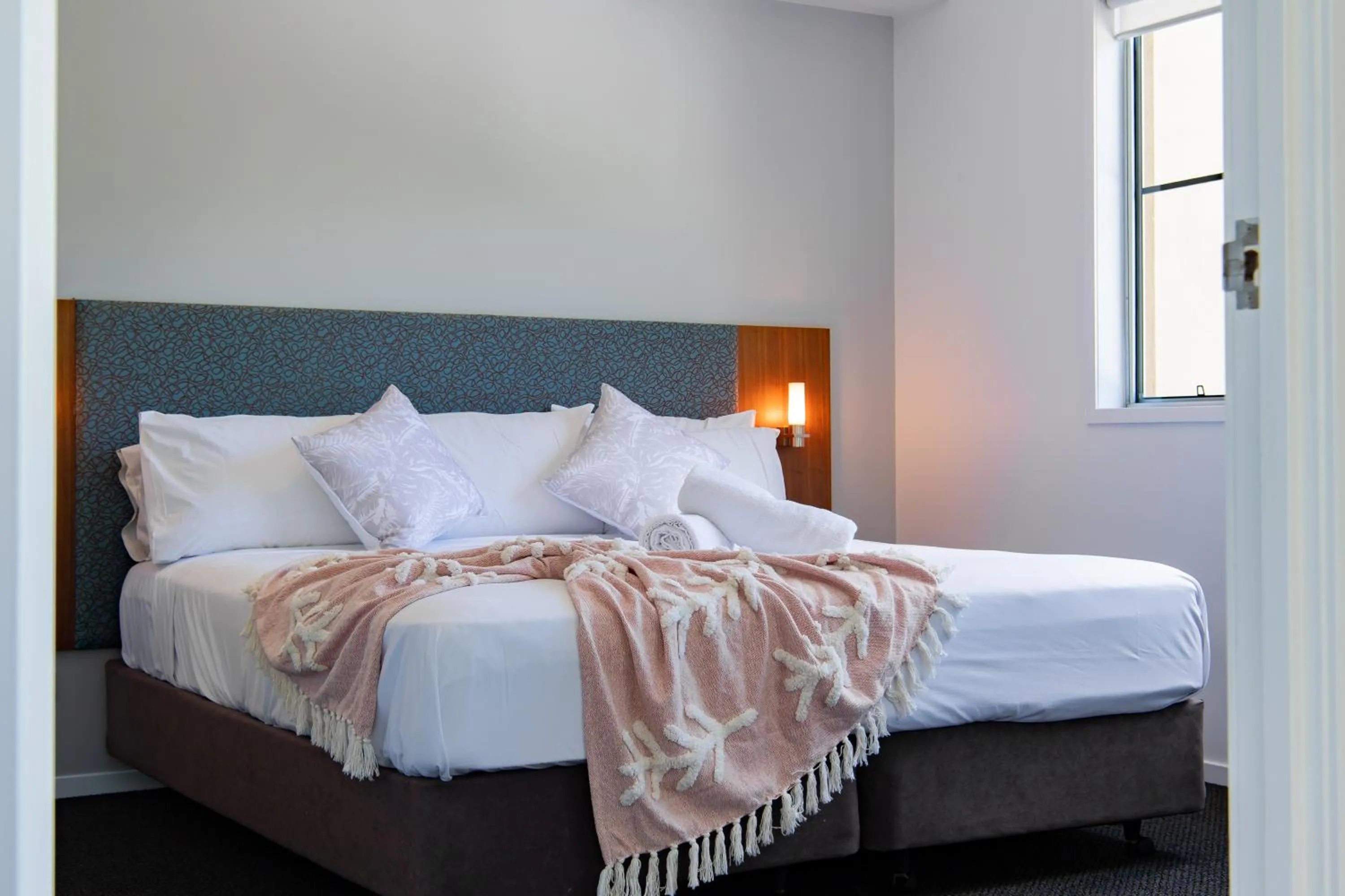 Bed in Airlie Summit Apartments