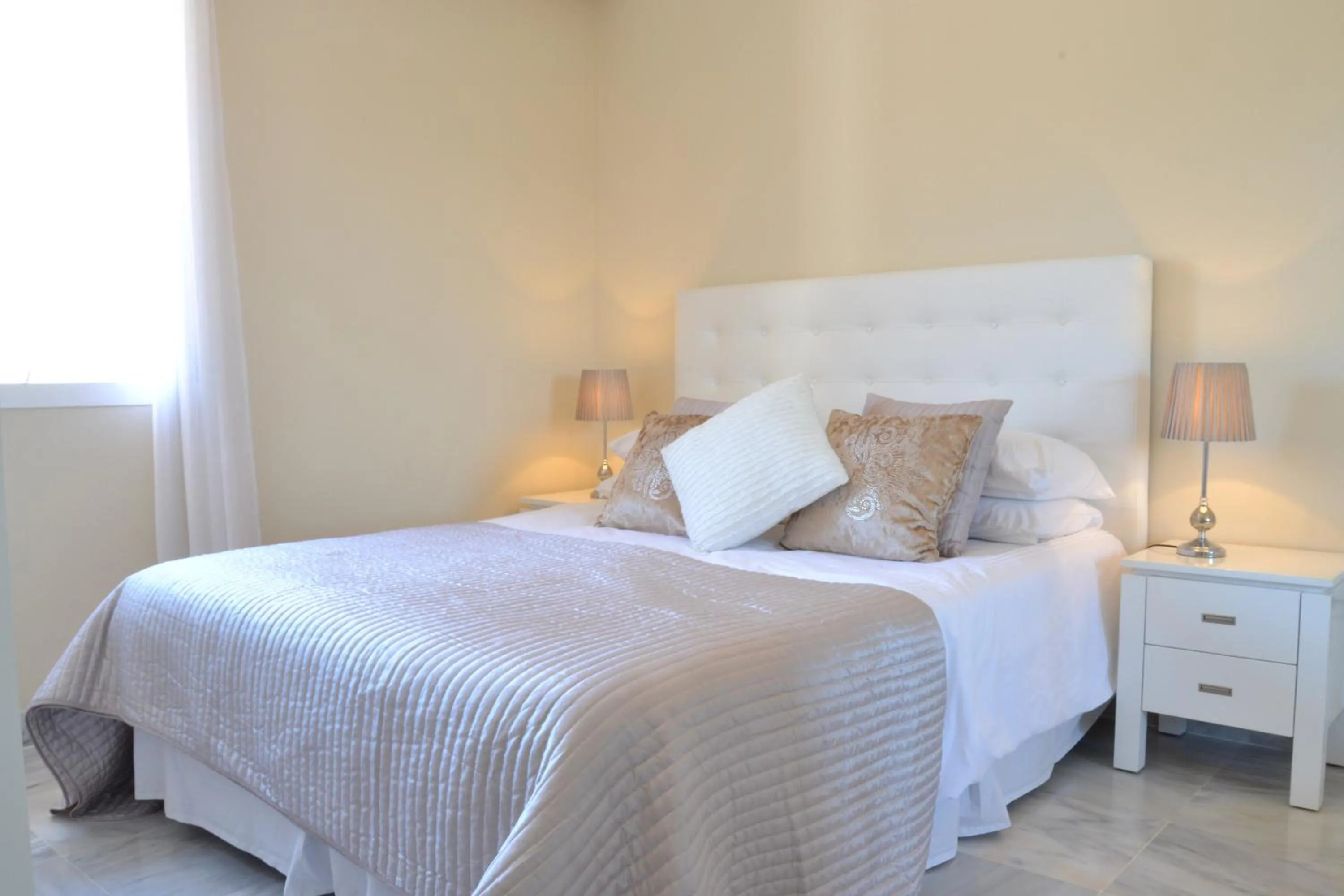 Bed in Dama de Noche Penthouse RDR110