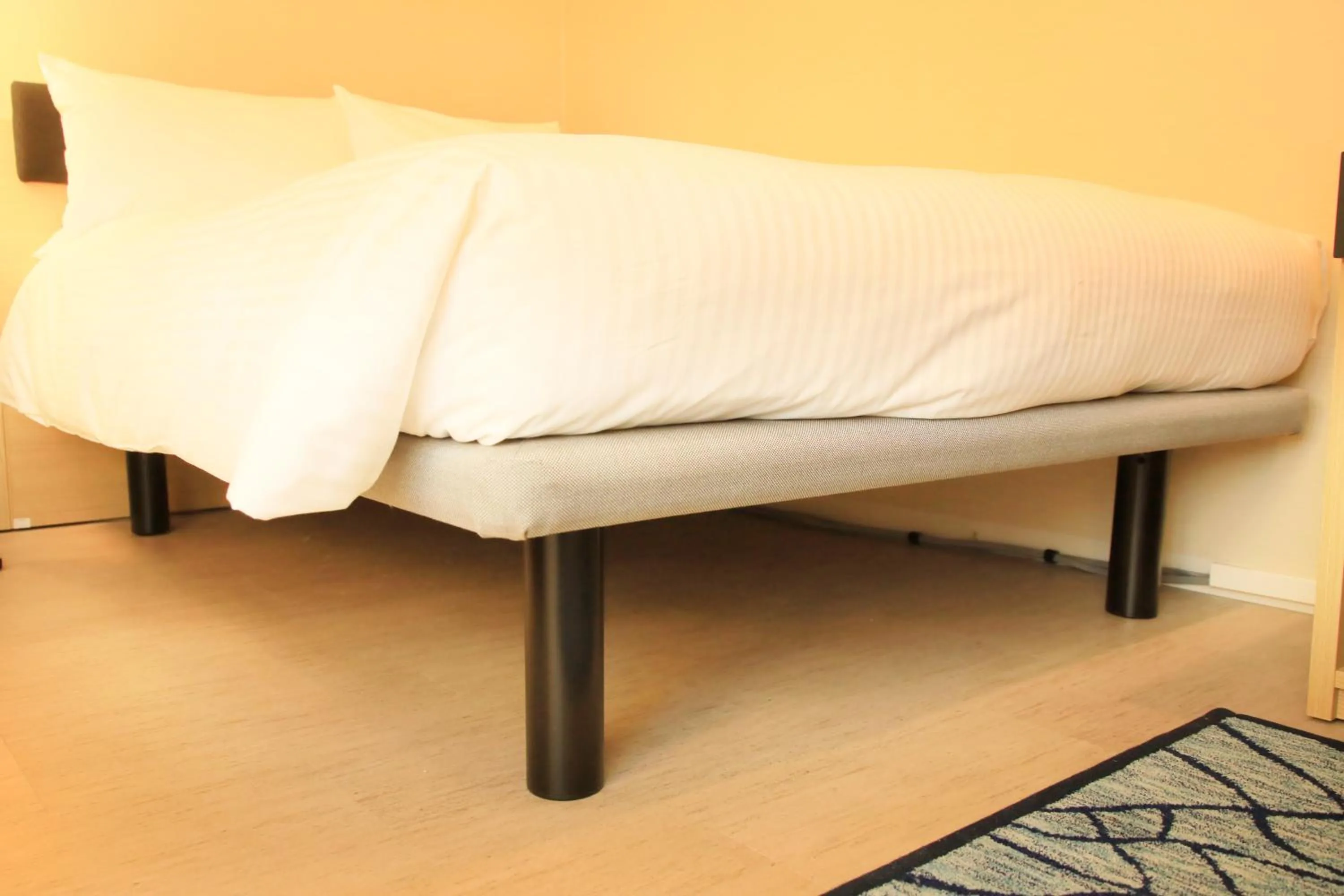 Bed in Hotel Nihonbashi Saibo