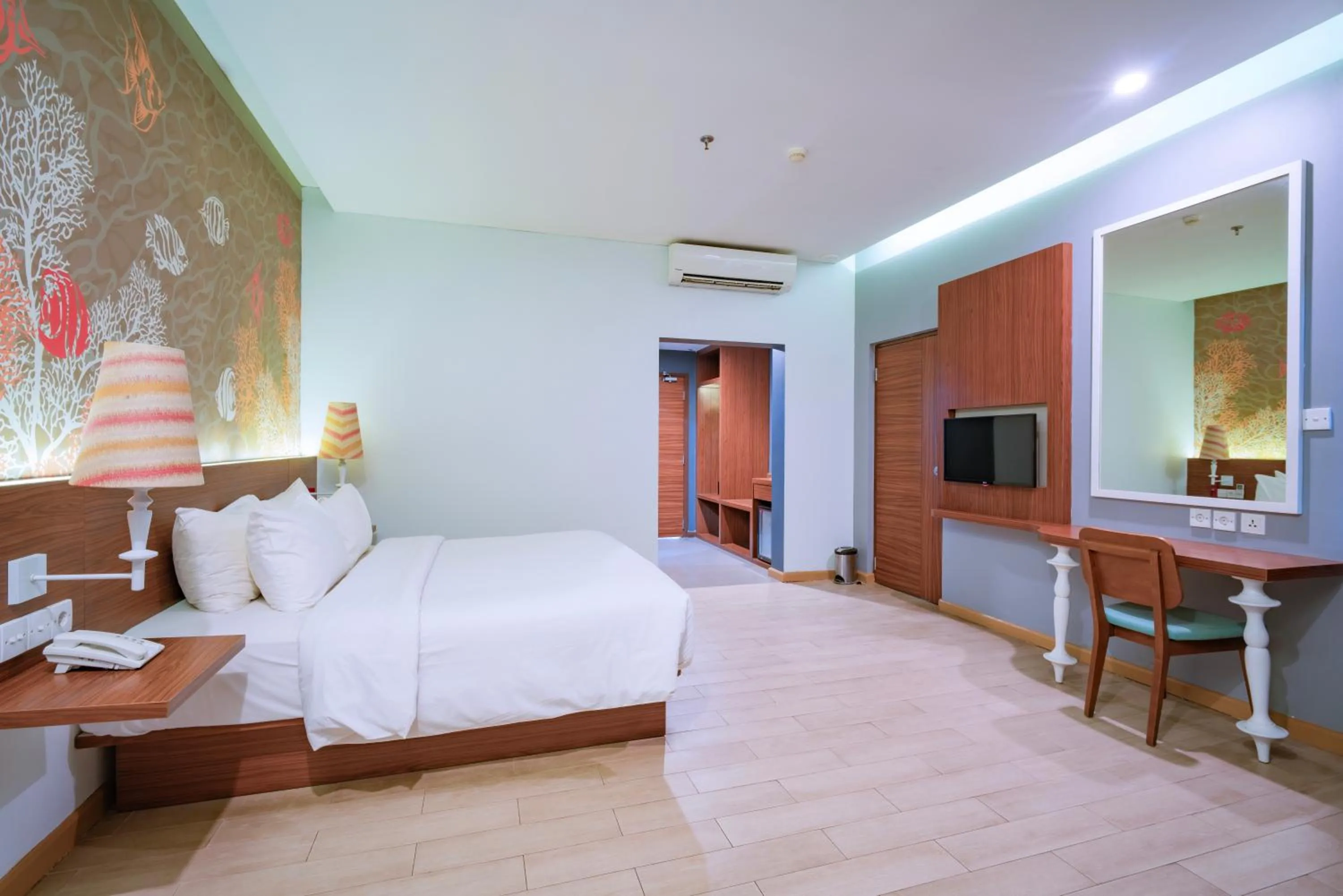 Bed in Manado Tateli Resort and Convention