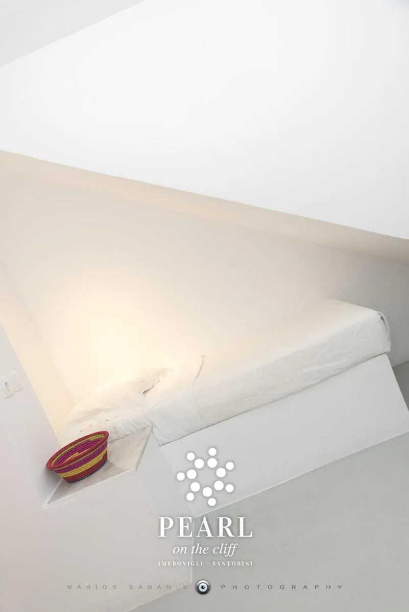 Bed in Pearl on the Cliff Hotel & Suites by Pearl Hotel Collection