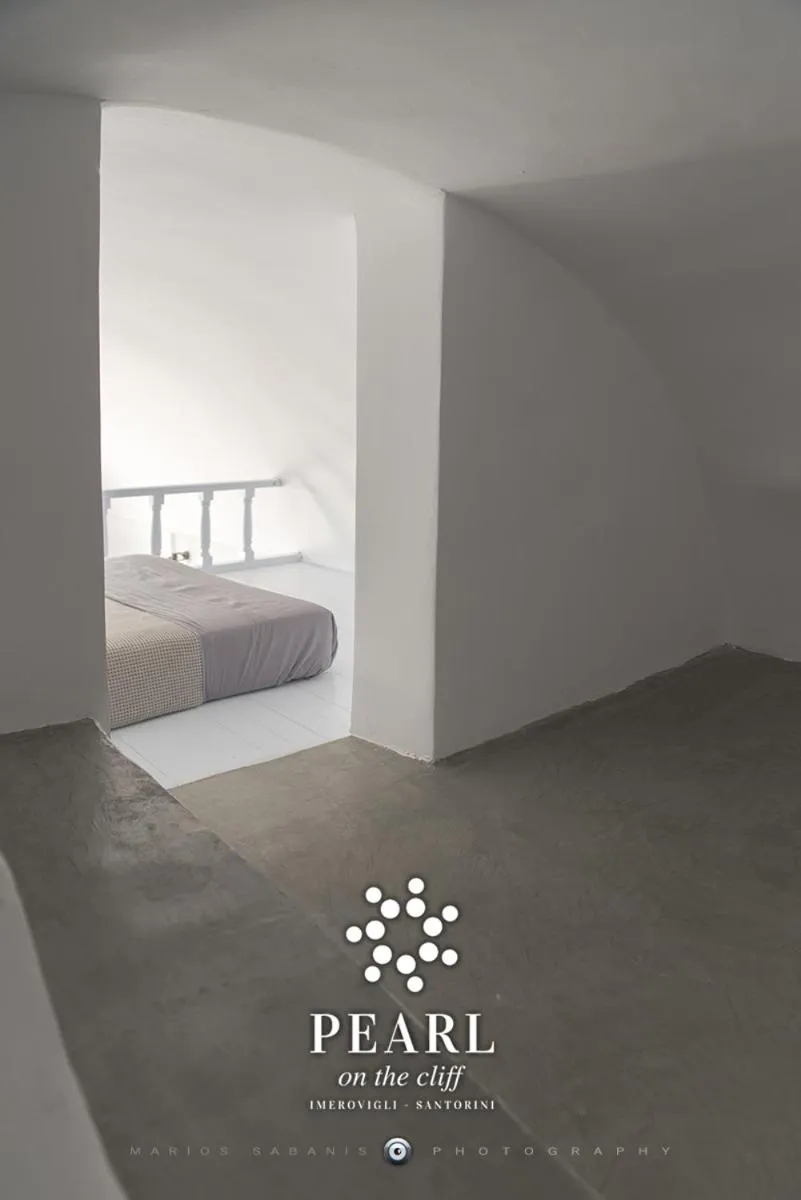 Bed in Pearl on the Cliff Hotel & Suites by Pearl Hotel Collection