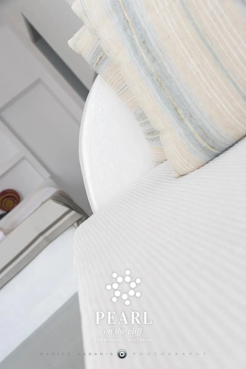 Bed in Pearl on the Cliff Hotel & Suites by Pearl Hotel Collection