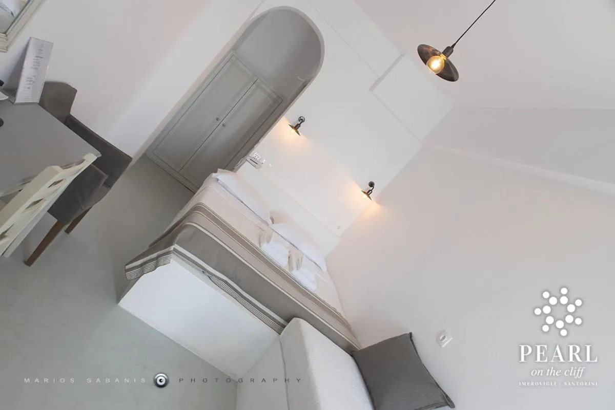 Bed in Pearl on the Cliff Hotel & Suites by Pearl Hotel Collection