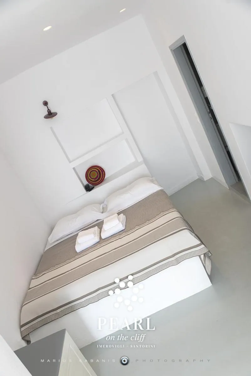 Bed in Pearl on the Cliff Hotel & Suites by Pearl Hotel Collection