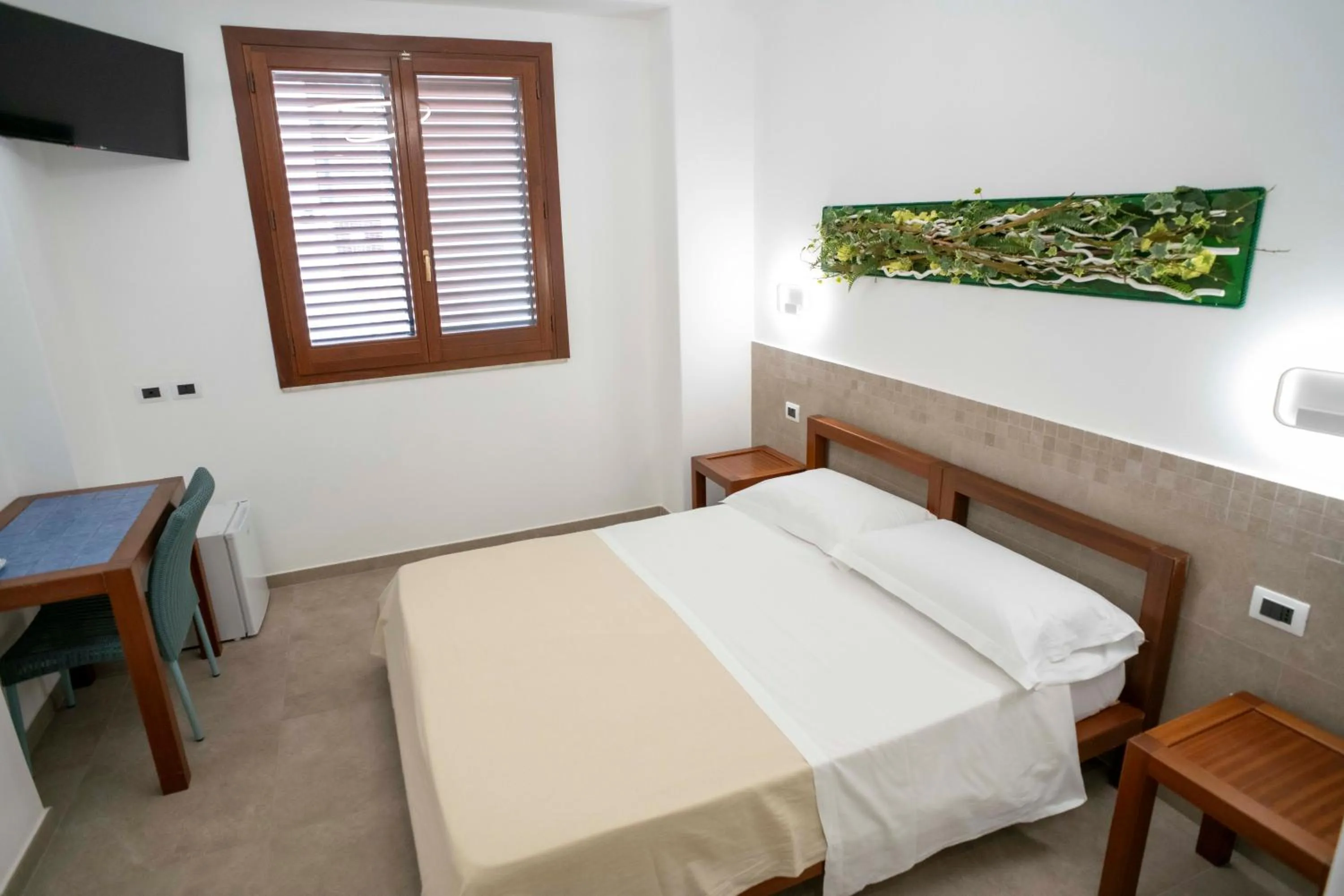 View (from property/room), Bed in Petit Hotel