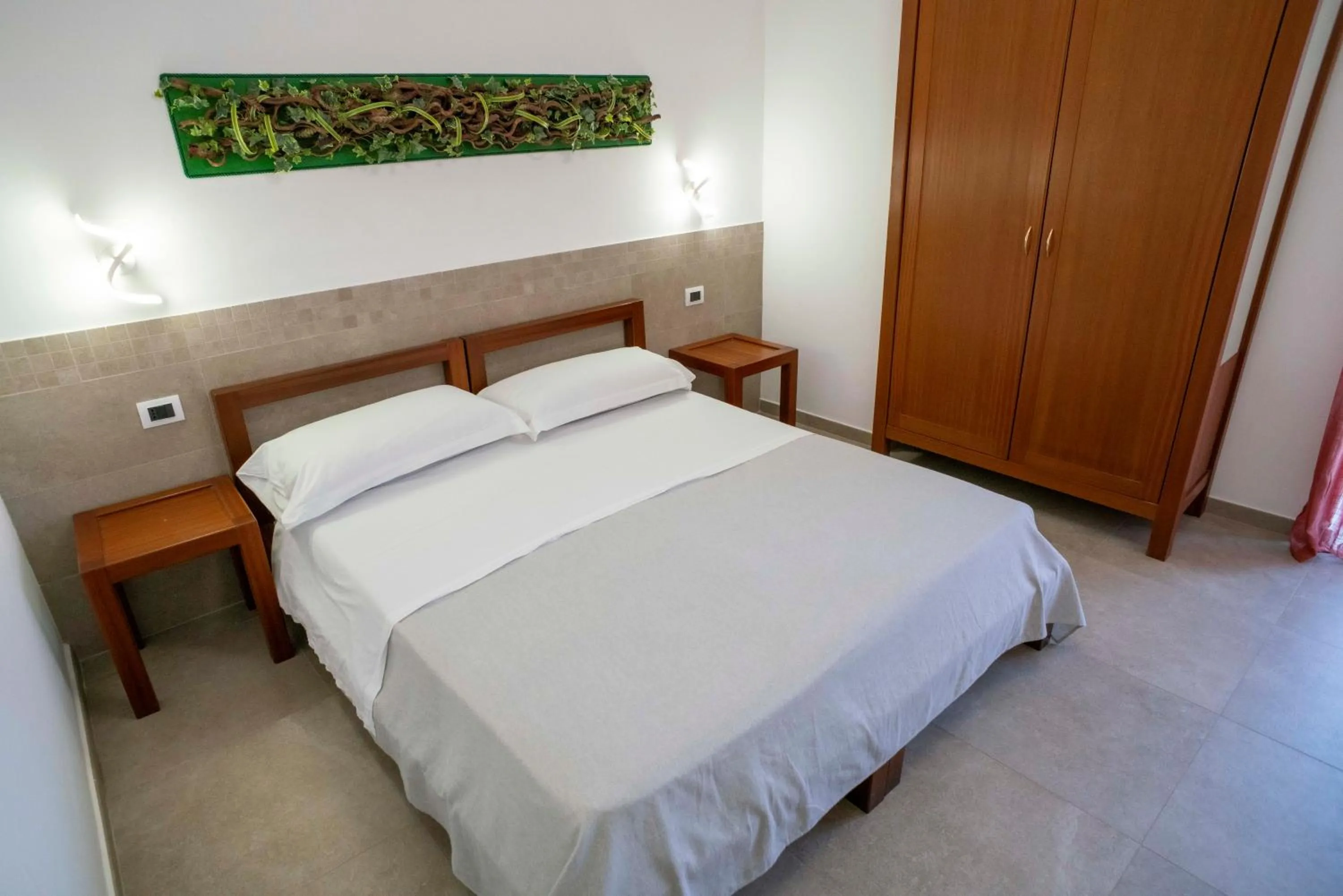 Bedroom, Bed in Petit Hotel