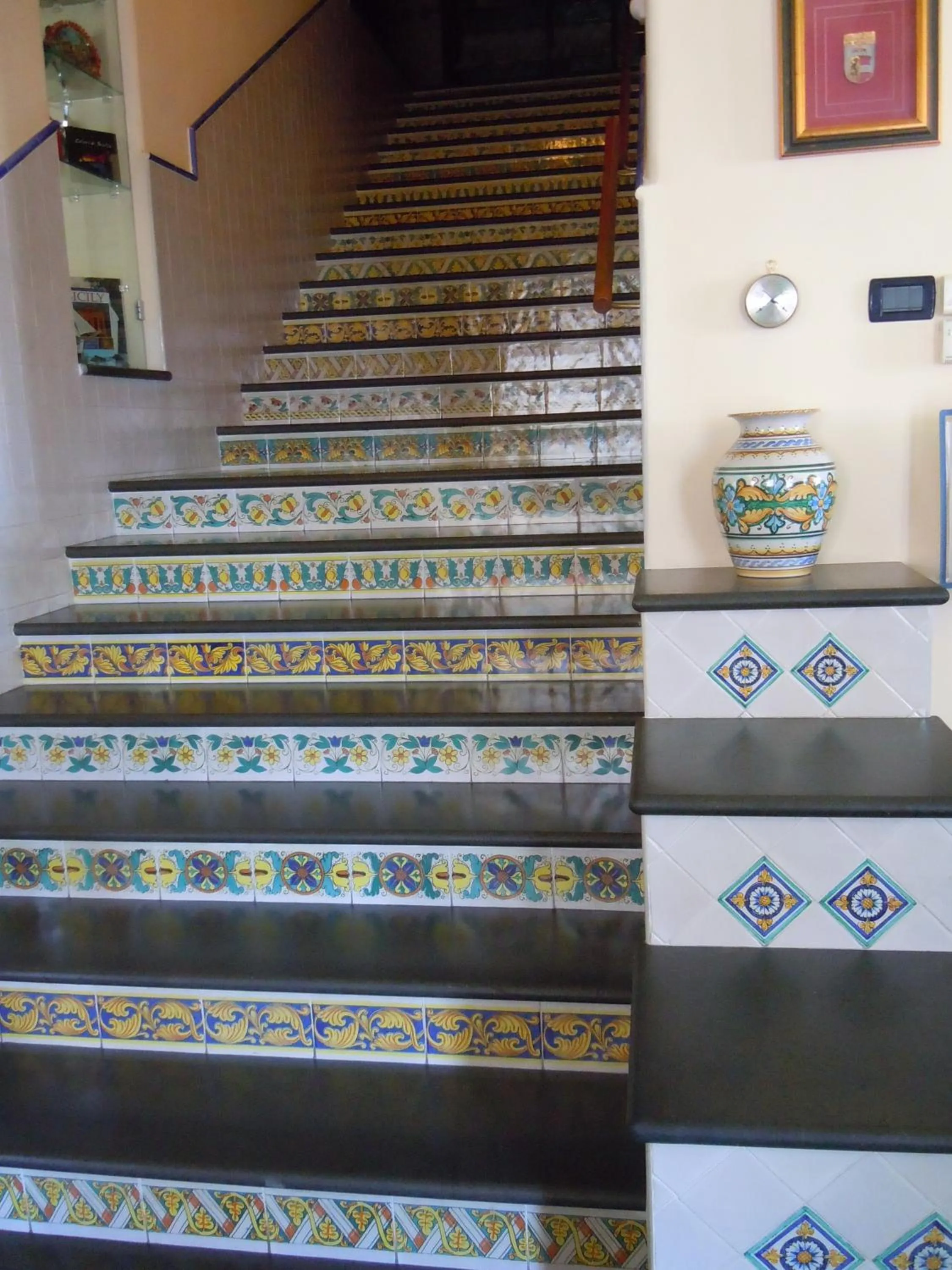 Communal lounge/ TV room in Petit Hotel