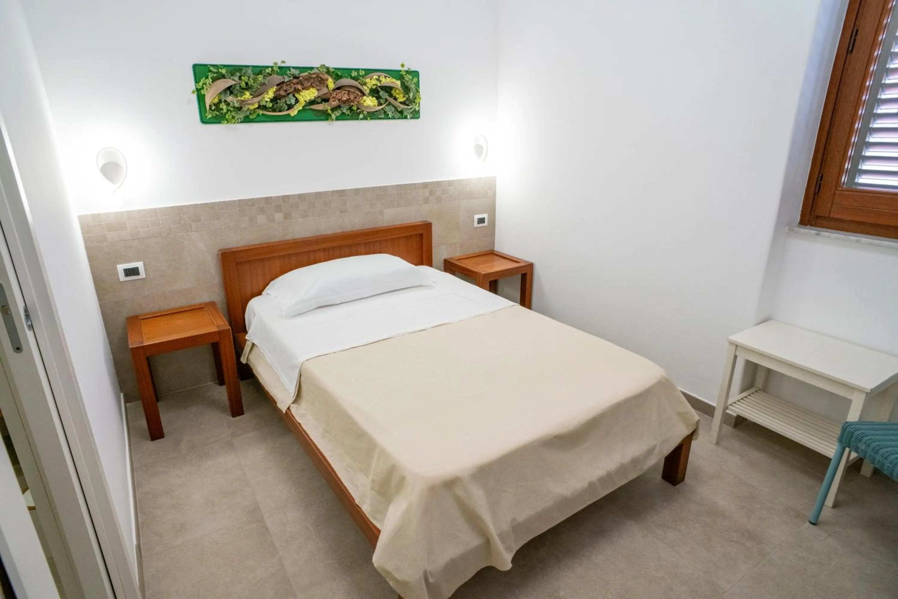 View (from property/room), Bed in Petit Hotel