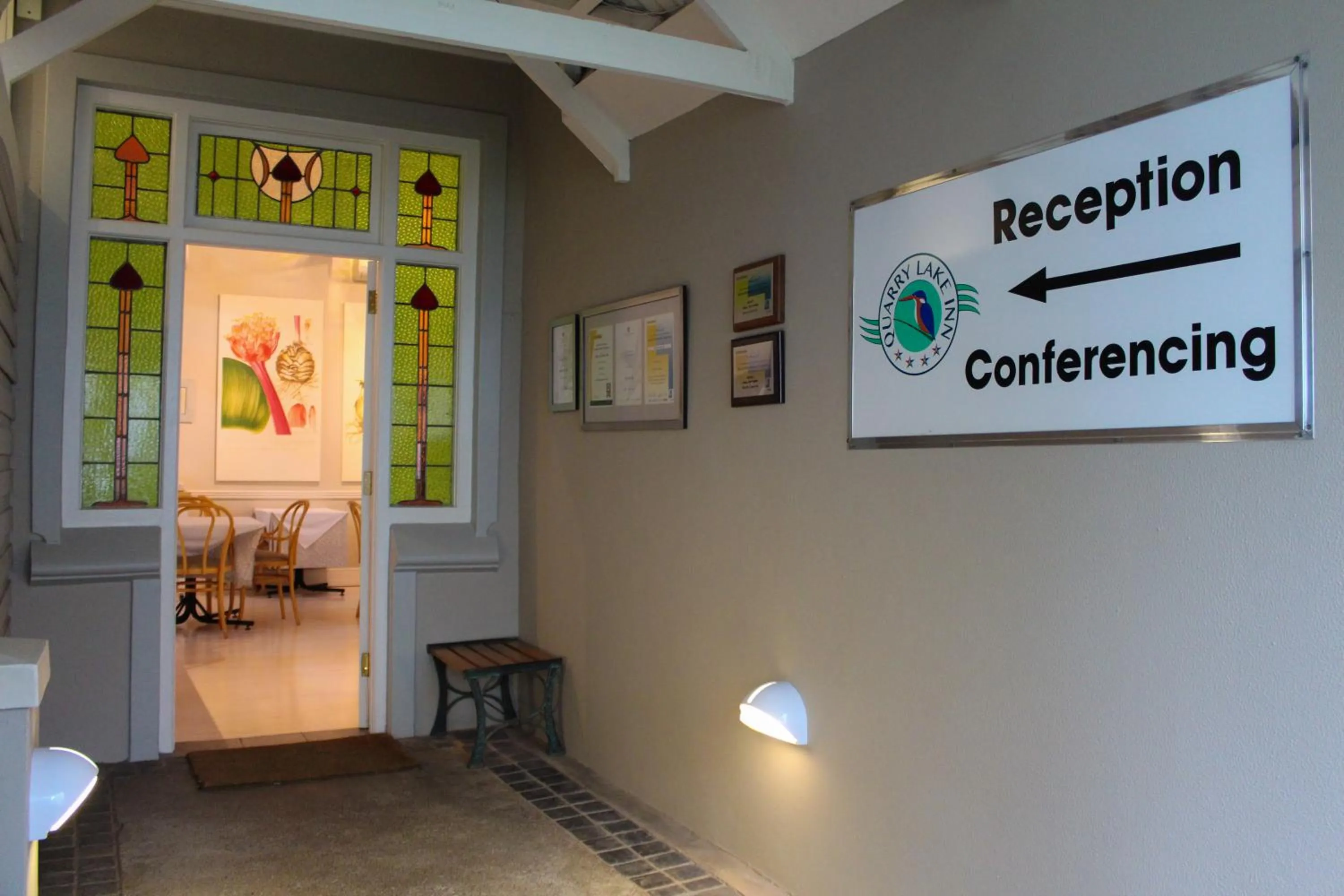 Property logo or sign in Quarry Lake Inn