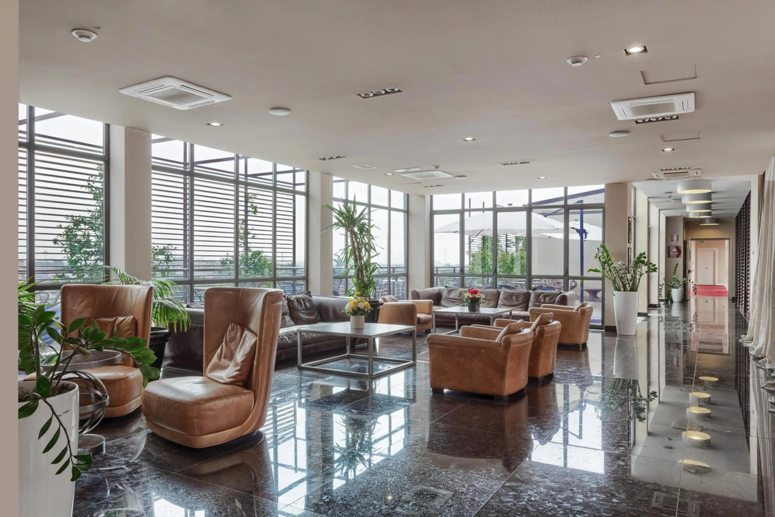 Communal lounge/ TV room in Italiana Hotels Milan Rho Fair