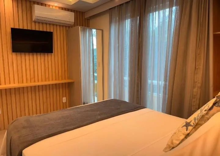 Bed in Hotel Pousada Casacolina