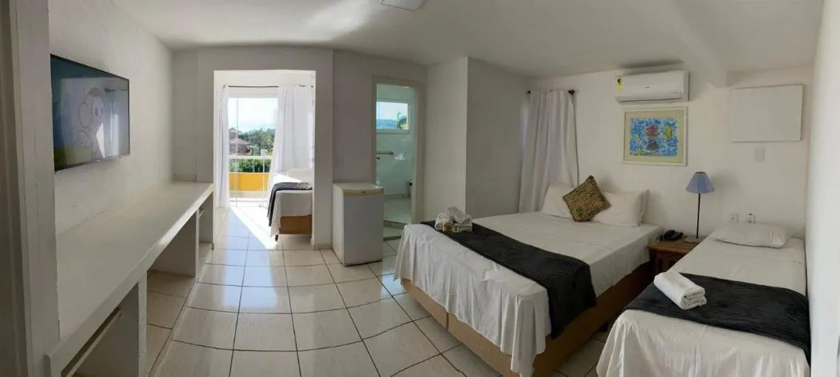 Bed in Hotel Pousada Casacolina