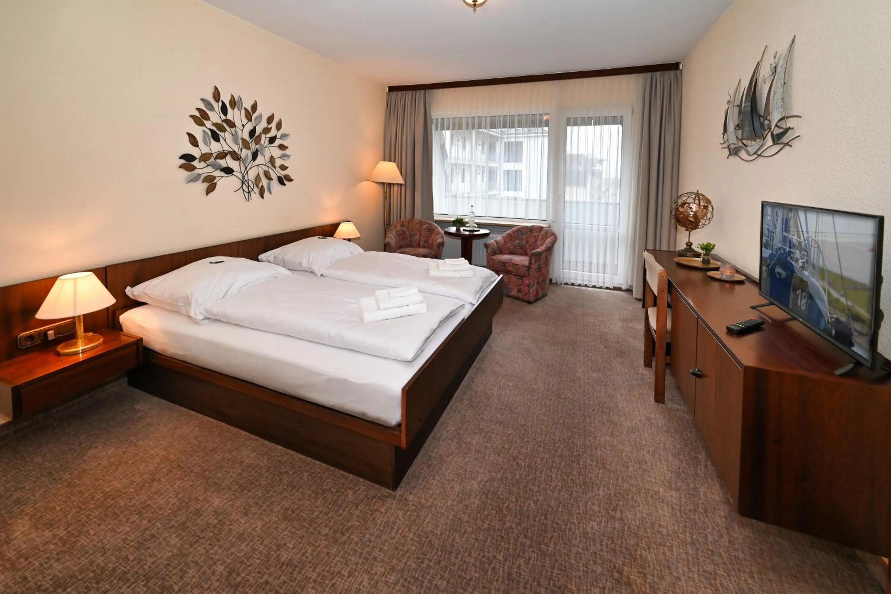 Photo of the whole room, Bed in Strandhotel Salty