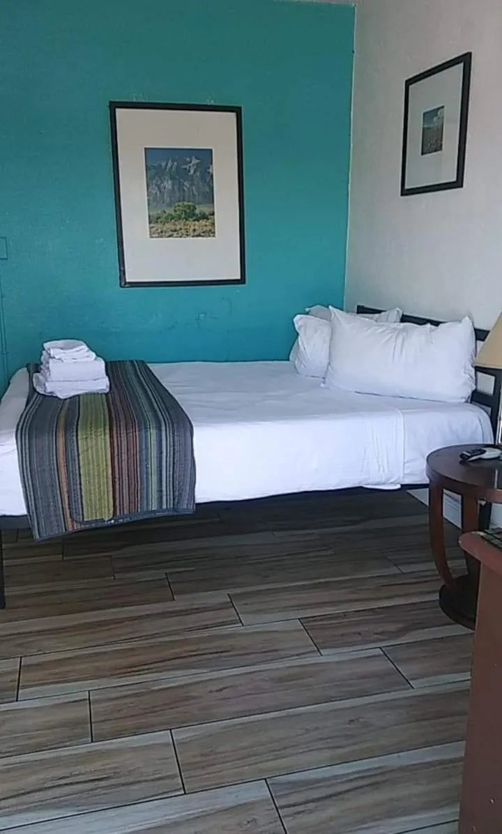 Bed in Desert Hills Motel