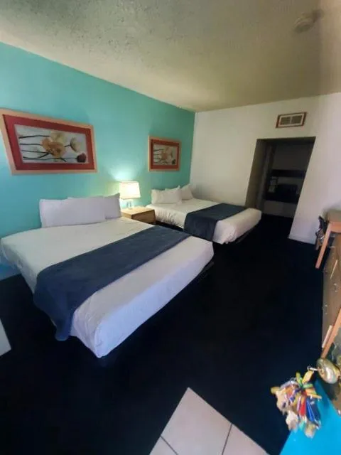 Bed in Desert Hills Motel