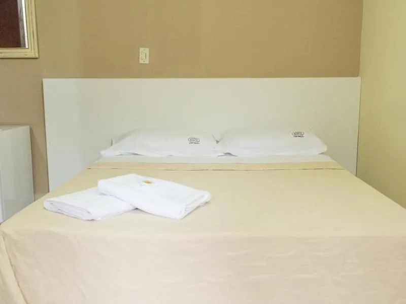 Bed in Pousada Dom Fernandes