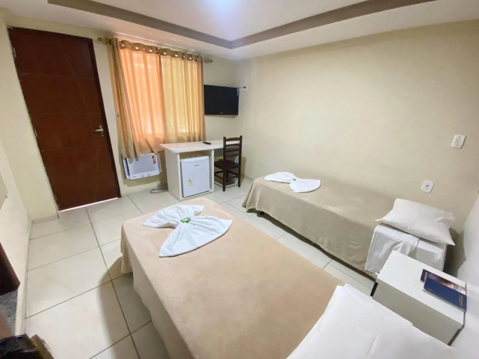 Bed in Pousada Dom Fernandes