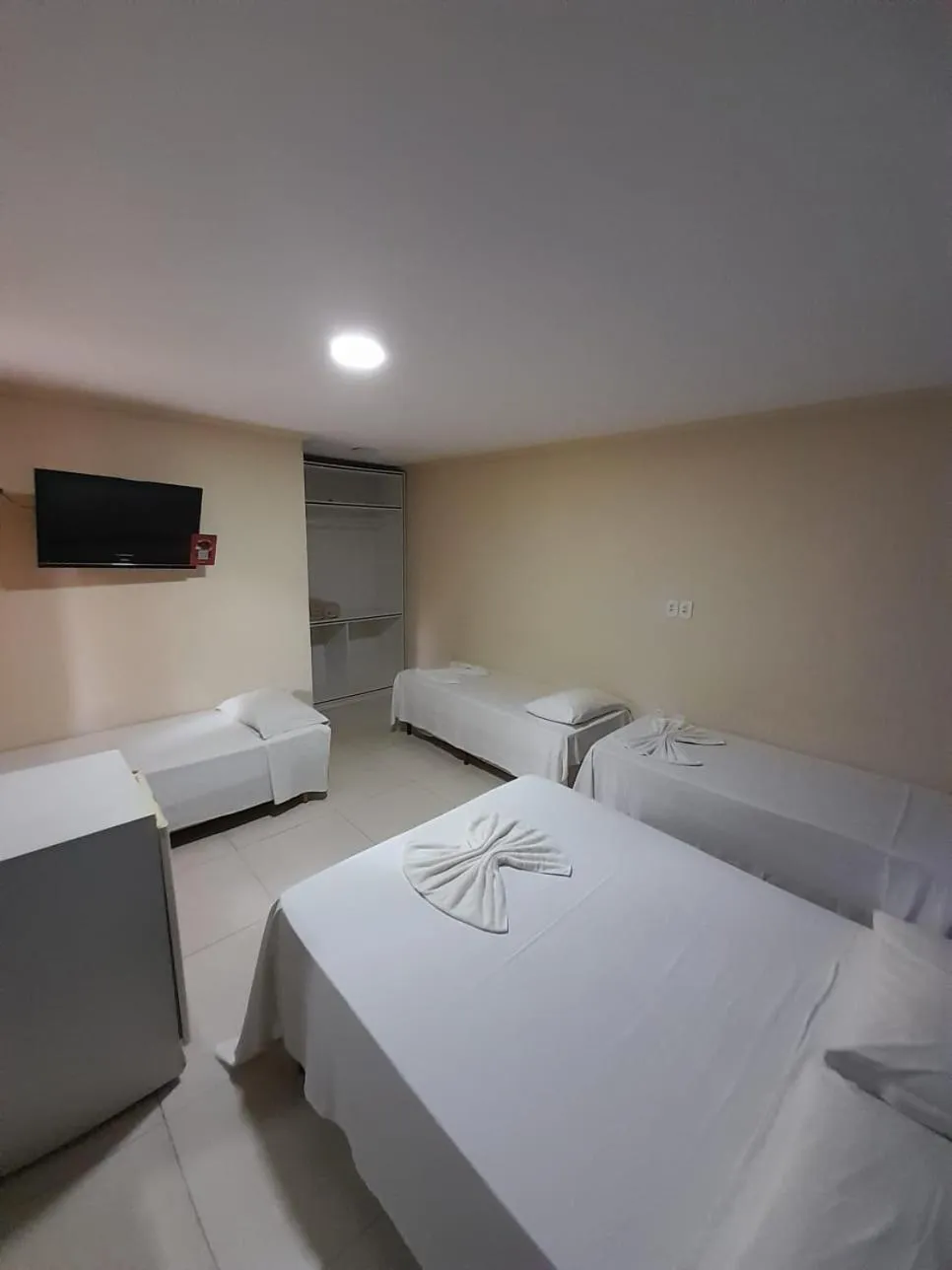 Bed in Pousada Dom Fernandes