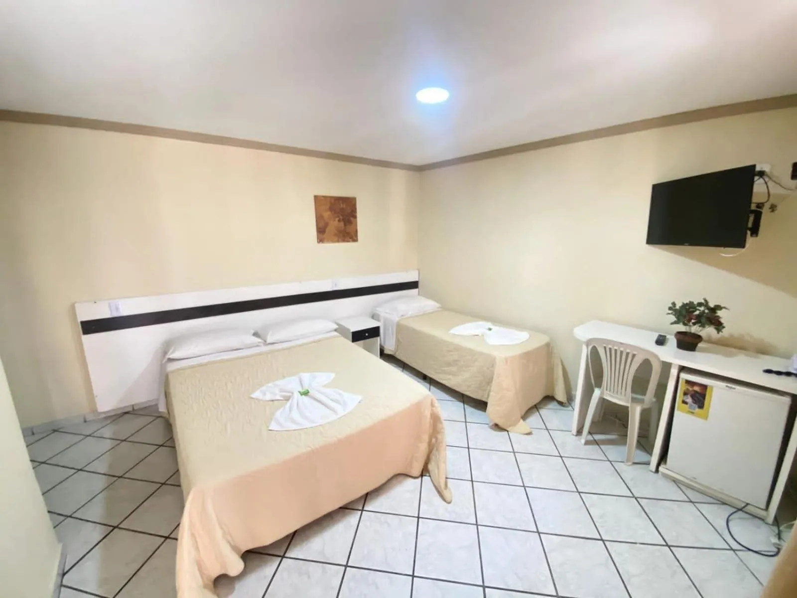 Bed in Pousada Dom Fernandes