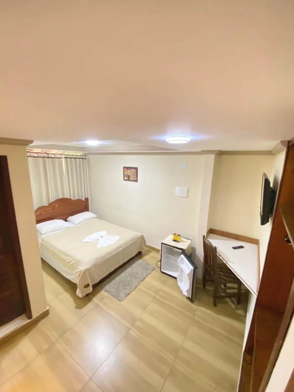 Bed in Pousada Dom Fernandes