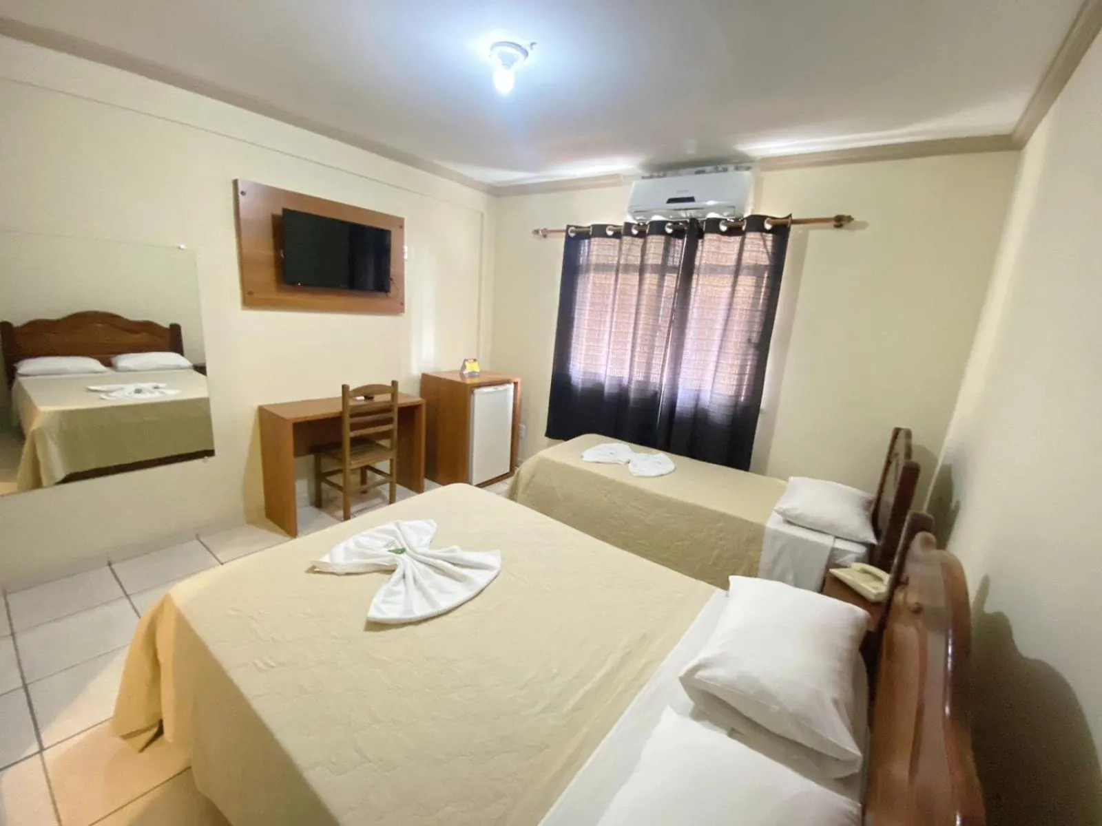 Bed in Pousada Dom Fernandes