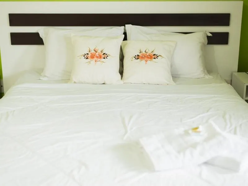 Bed in Pousada Dom Fernandes