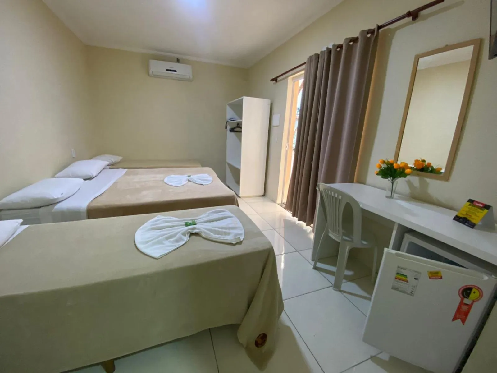 Bed in Pousada Dom Fernandes