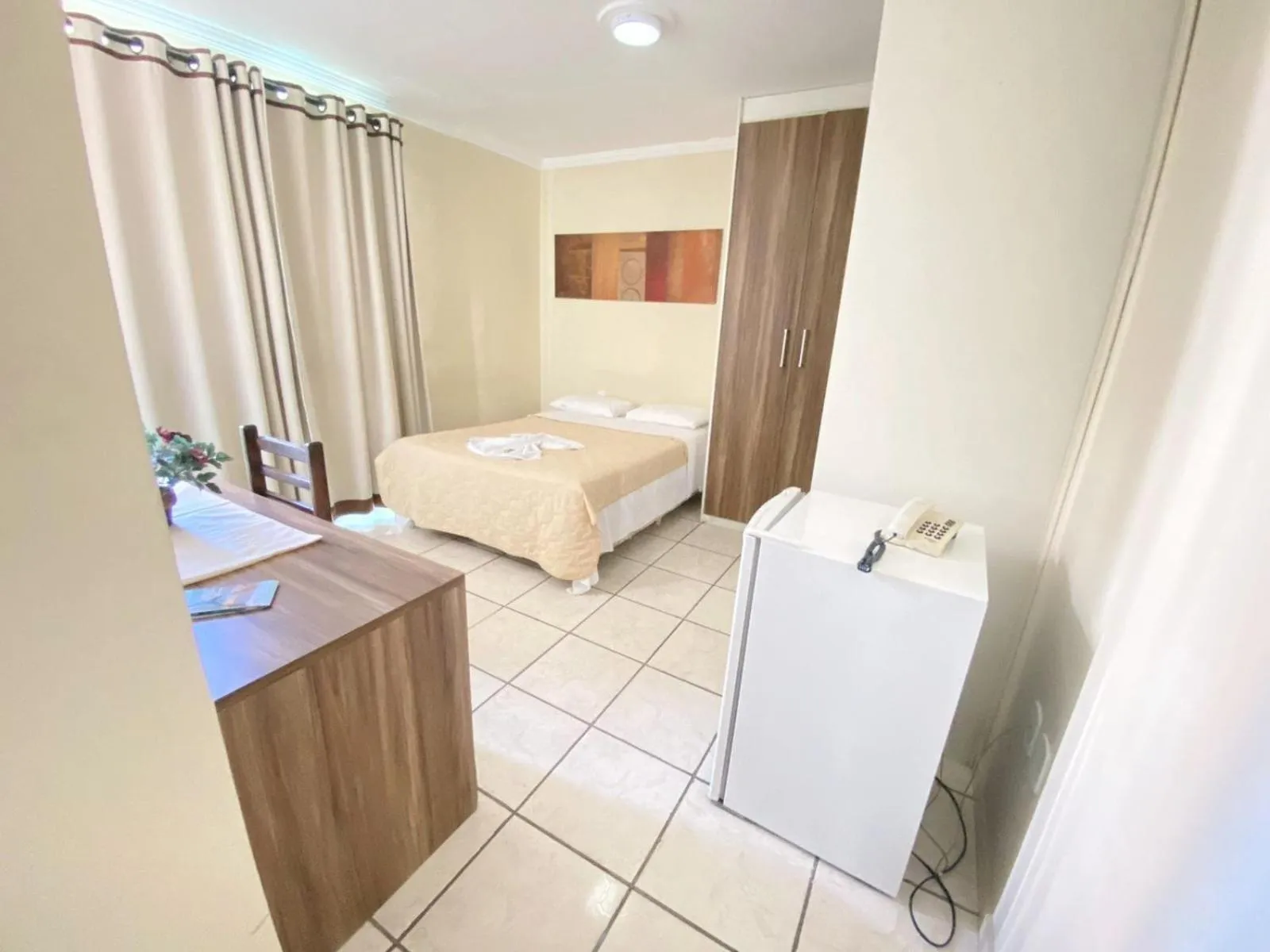 Bed in Pousada Dom Fernandes