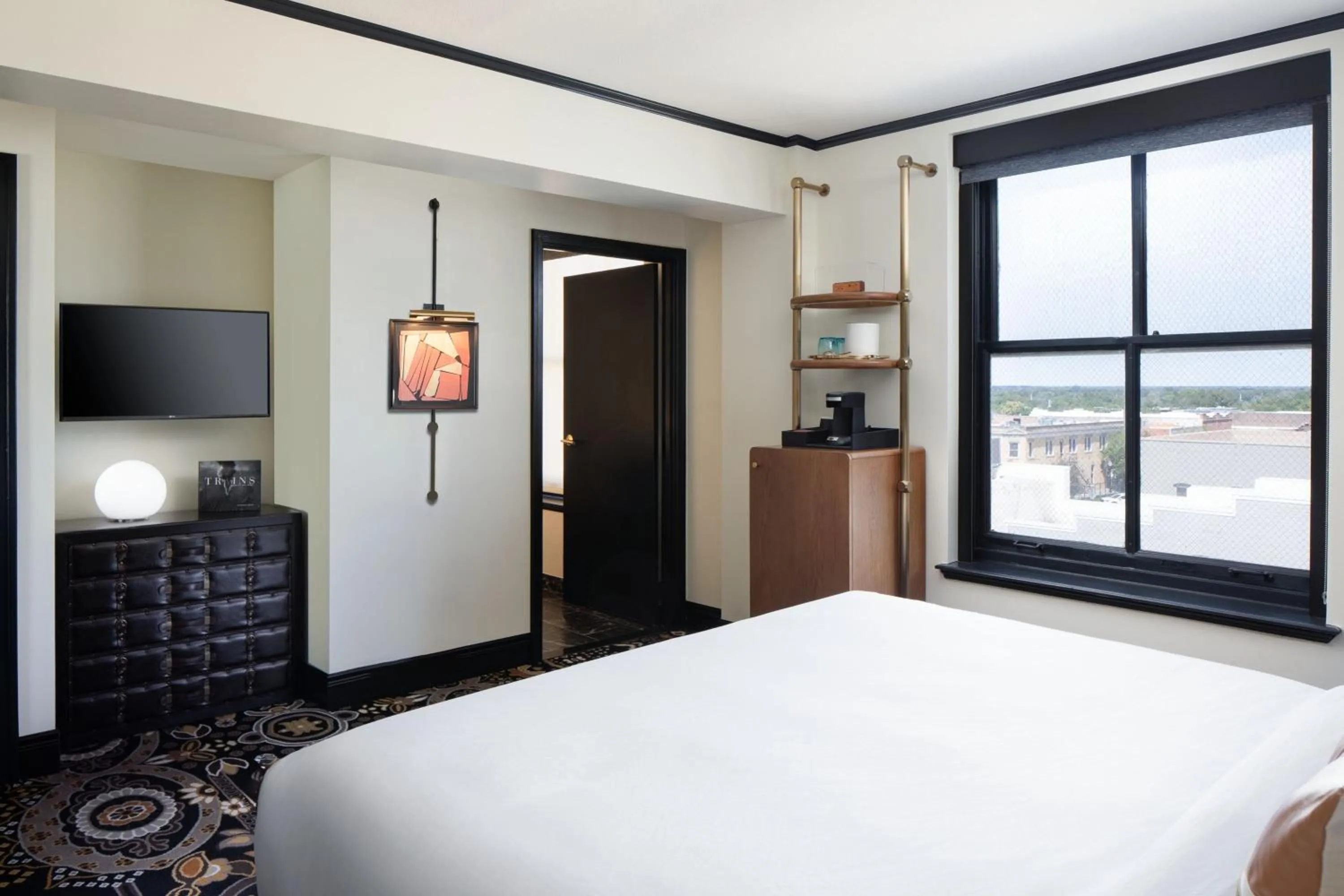 Photo of the whole room, Bed in The LaSalle Hotel, Bryan College Station, a Tribute Portfolio Hotel