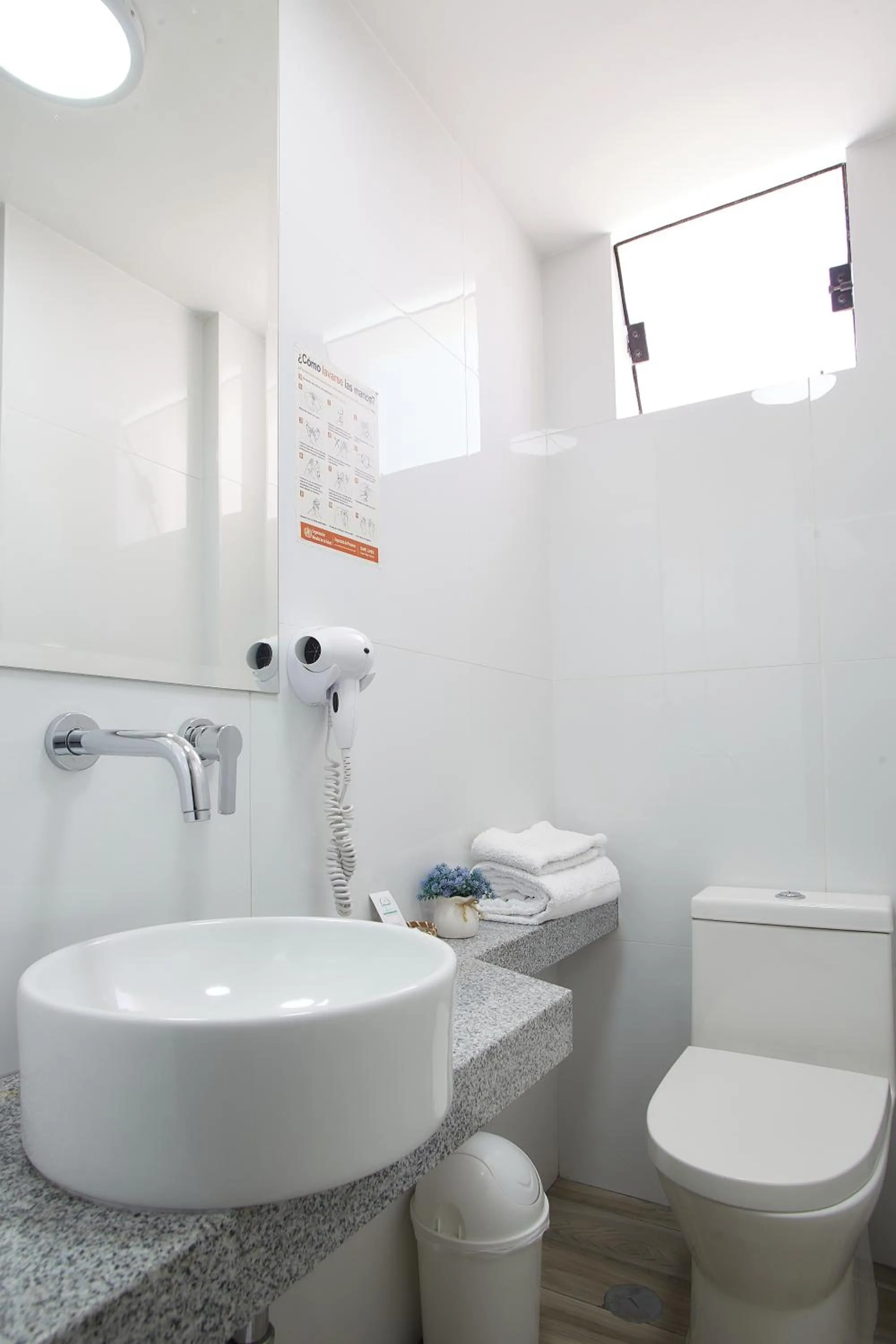 Bathroom in Natura Inn Hotel