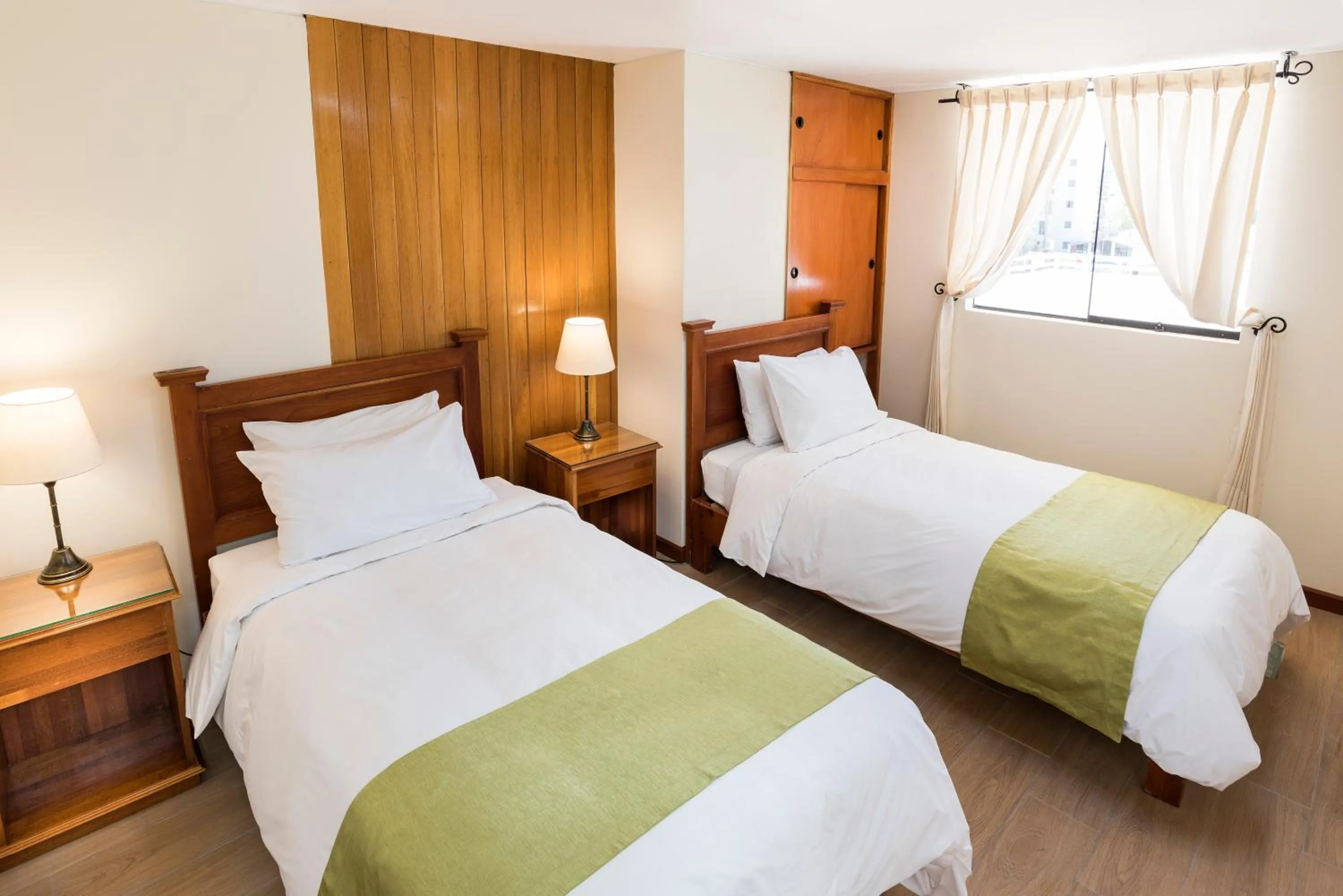 Bedroom, Bed in Natura Inn Hotel