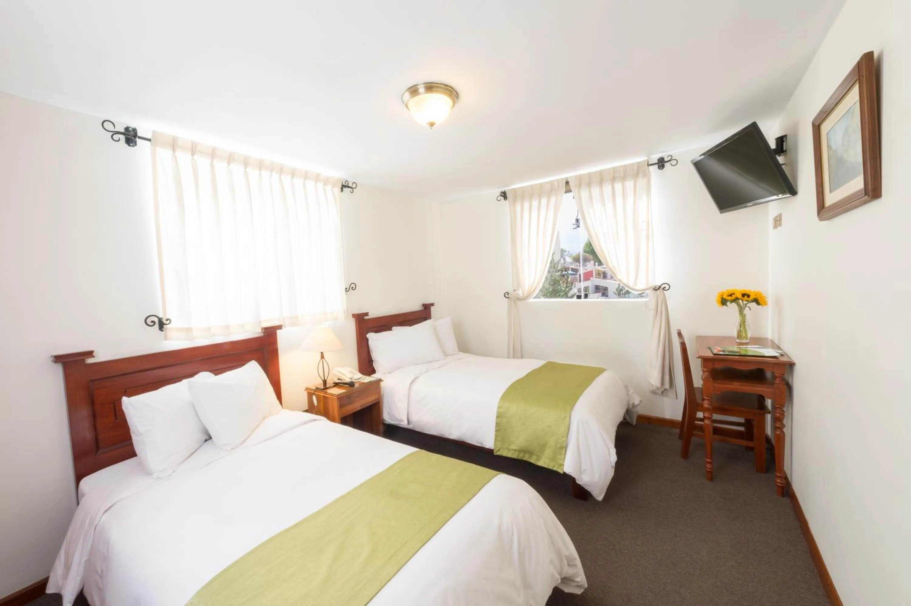 Bedroom, Bed in Natura Inn Hotel