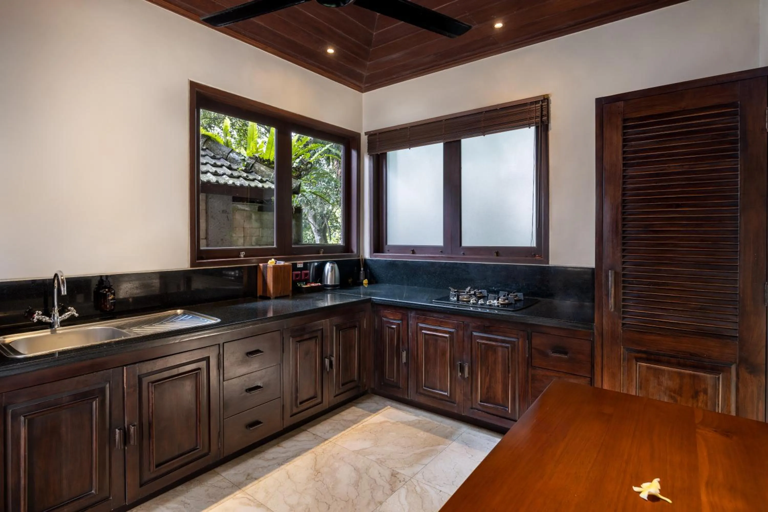 Kitchen or kitchenette in Bidadari Private Villas & Retreat