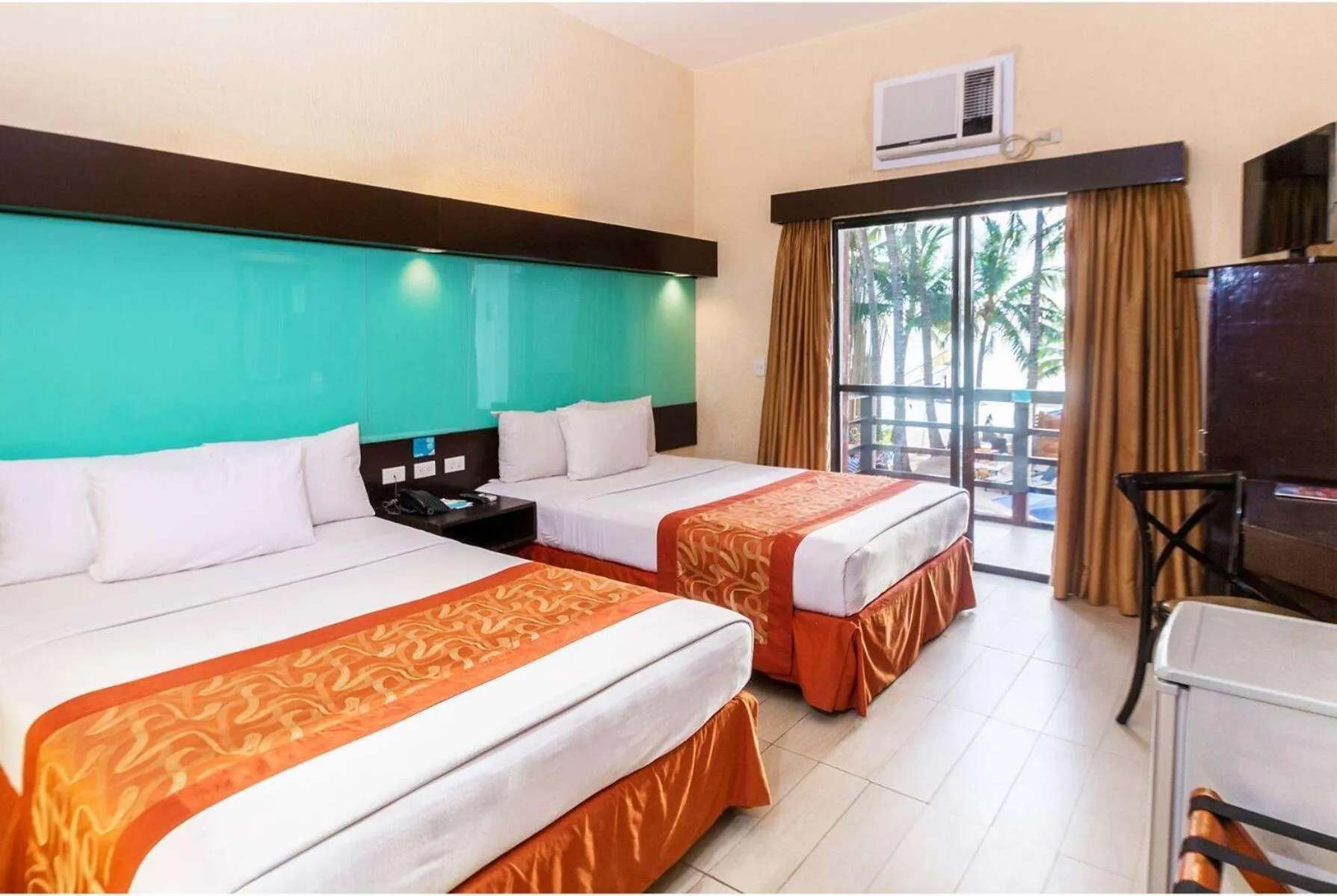 Photo of the whole room, Bed in Microtel by Wyndham Boracay