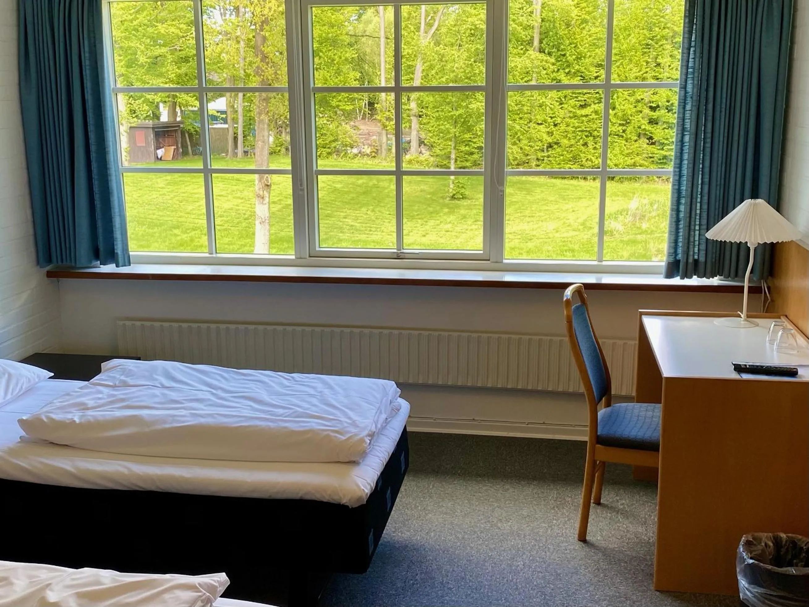 Photo of the whole room, Bed in Blommenslyst Kro