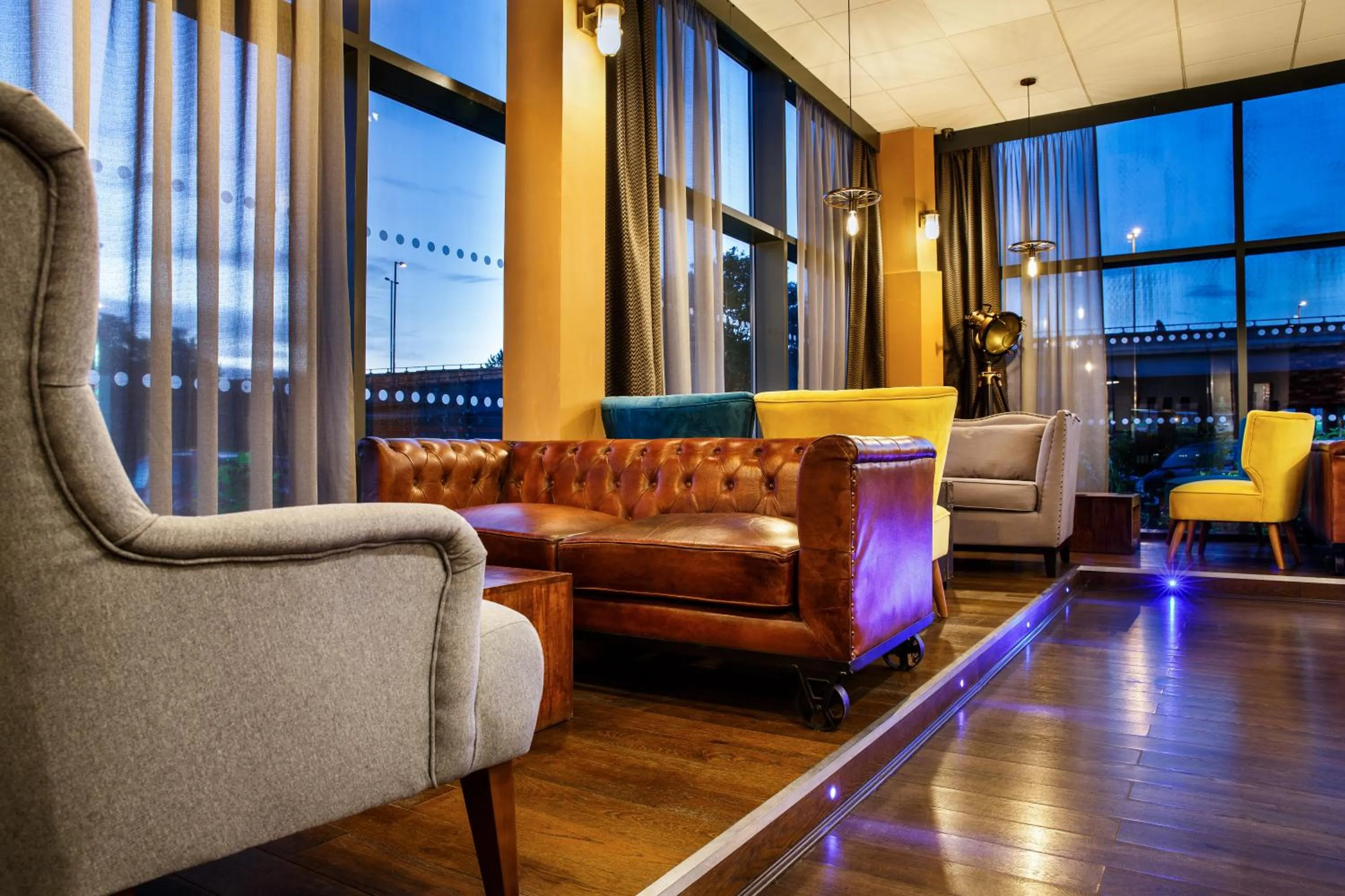 Communal lounge/ TV room, Seating Area in ibis Styles Birmingham Oldbury