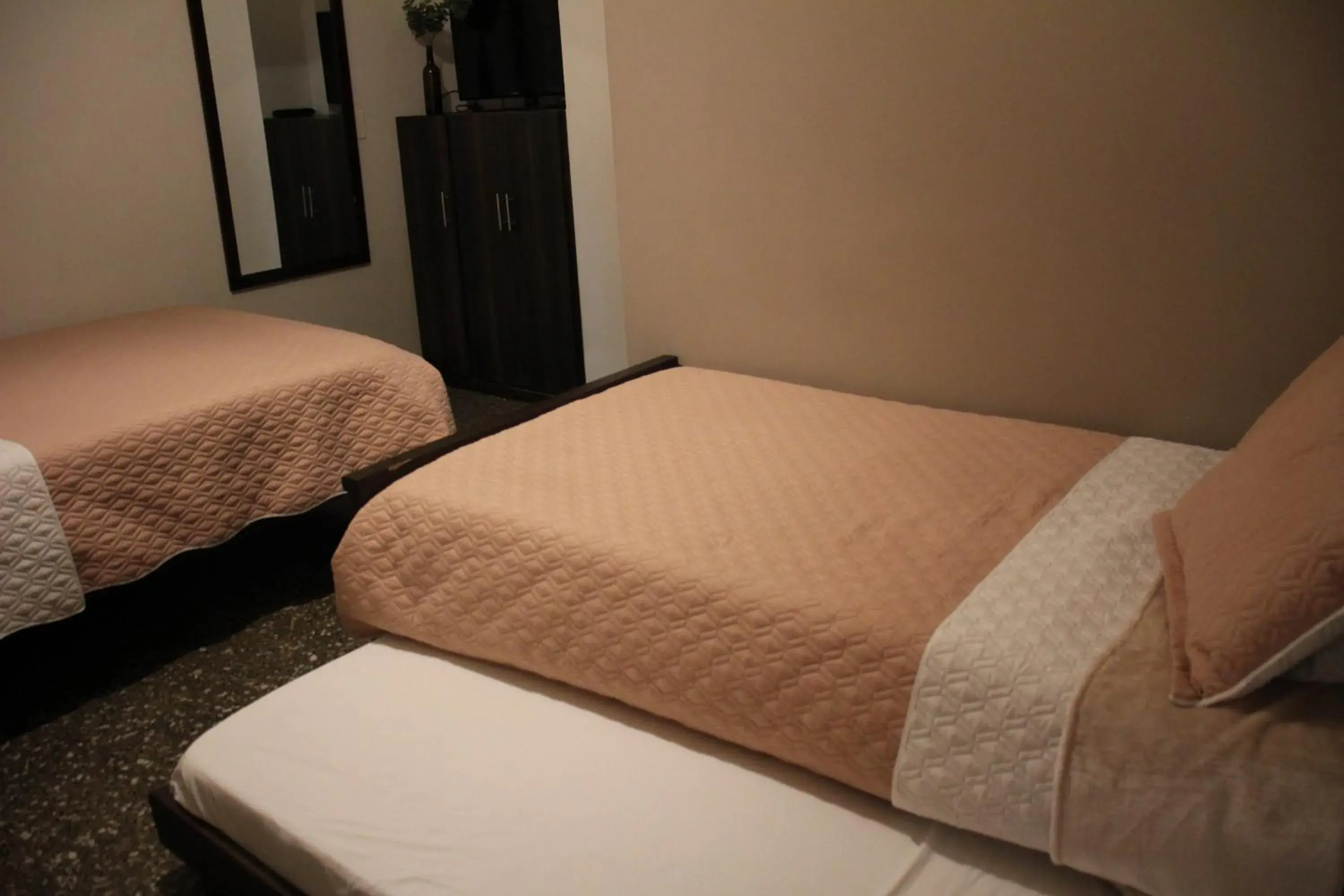 Standard Quadruple Room in Hotel Plaza El Santuario Standard Quadruple Room in Hotel Plaza El Santuario