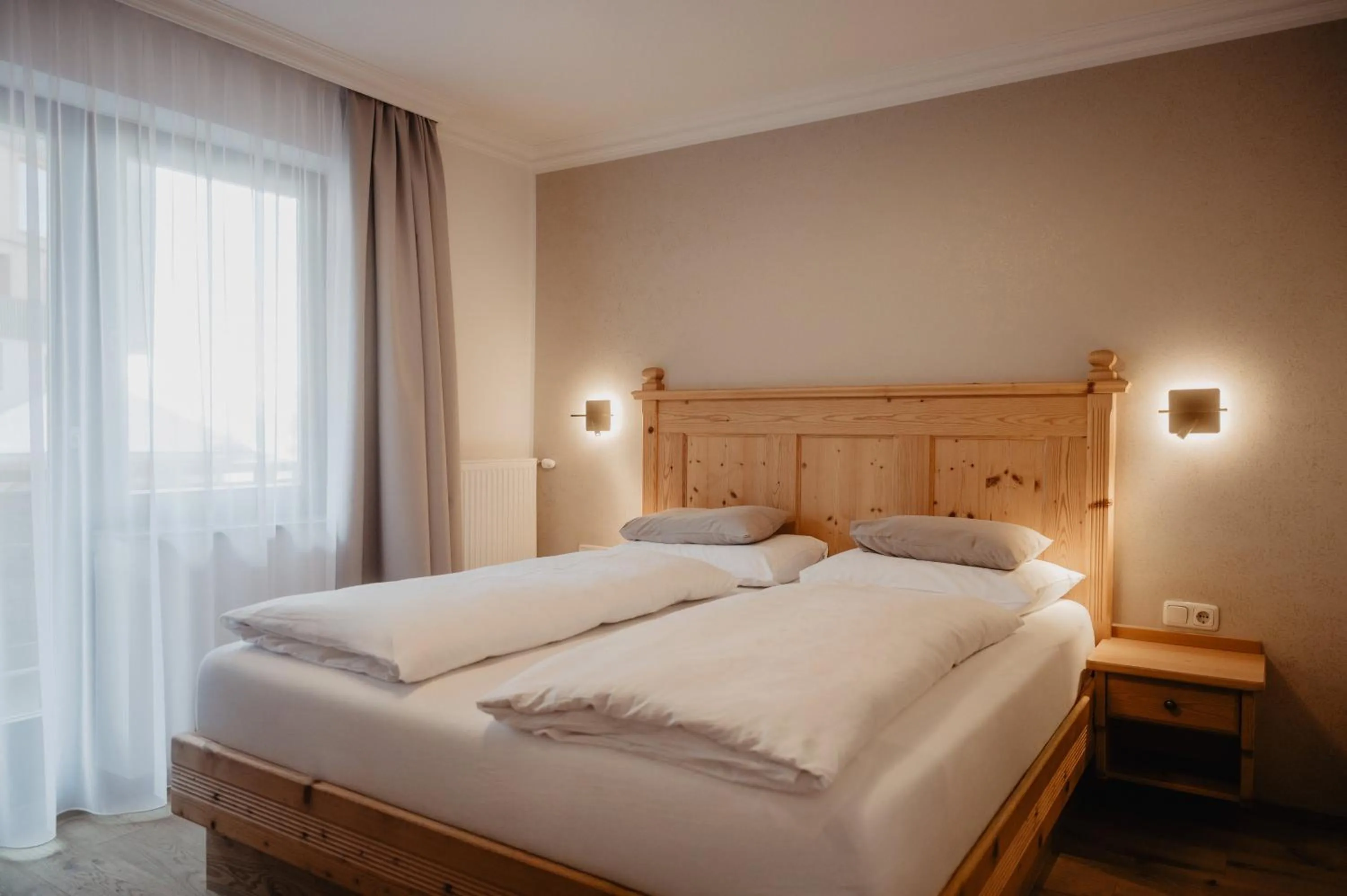 Bed in Hotel Berghof - St Johann in Salzburg