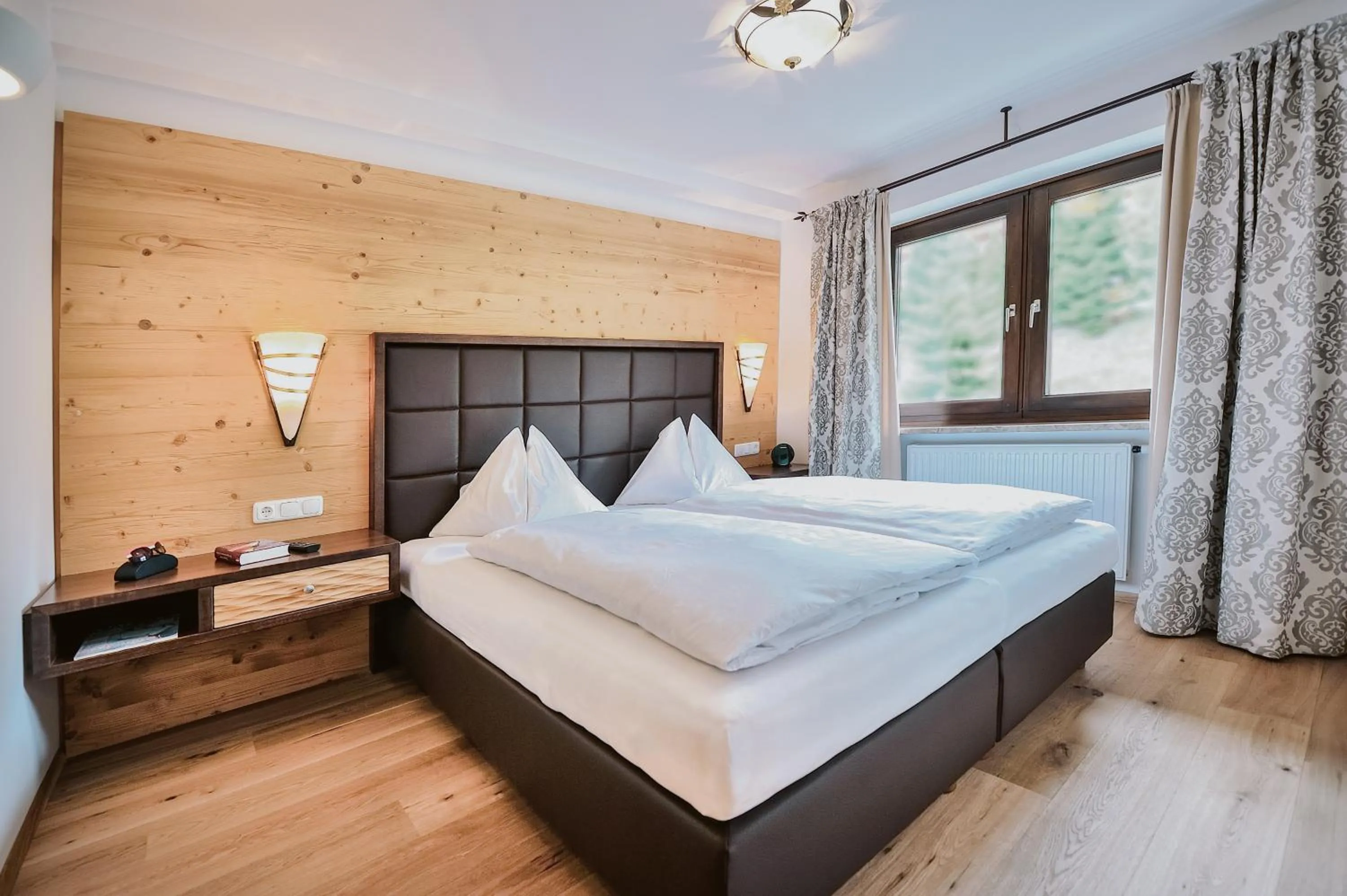 Bed in Verwöhnhotel Berghof