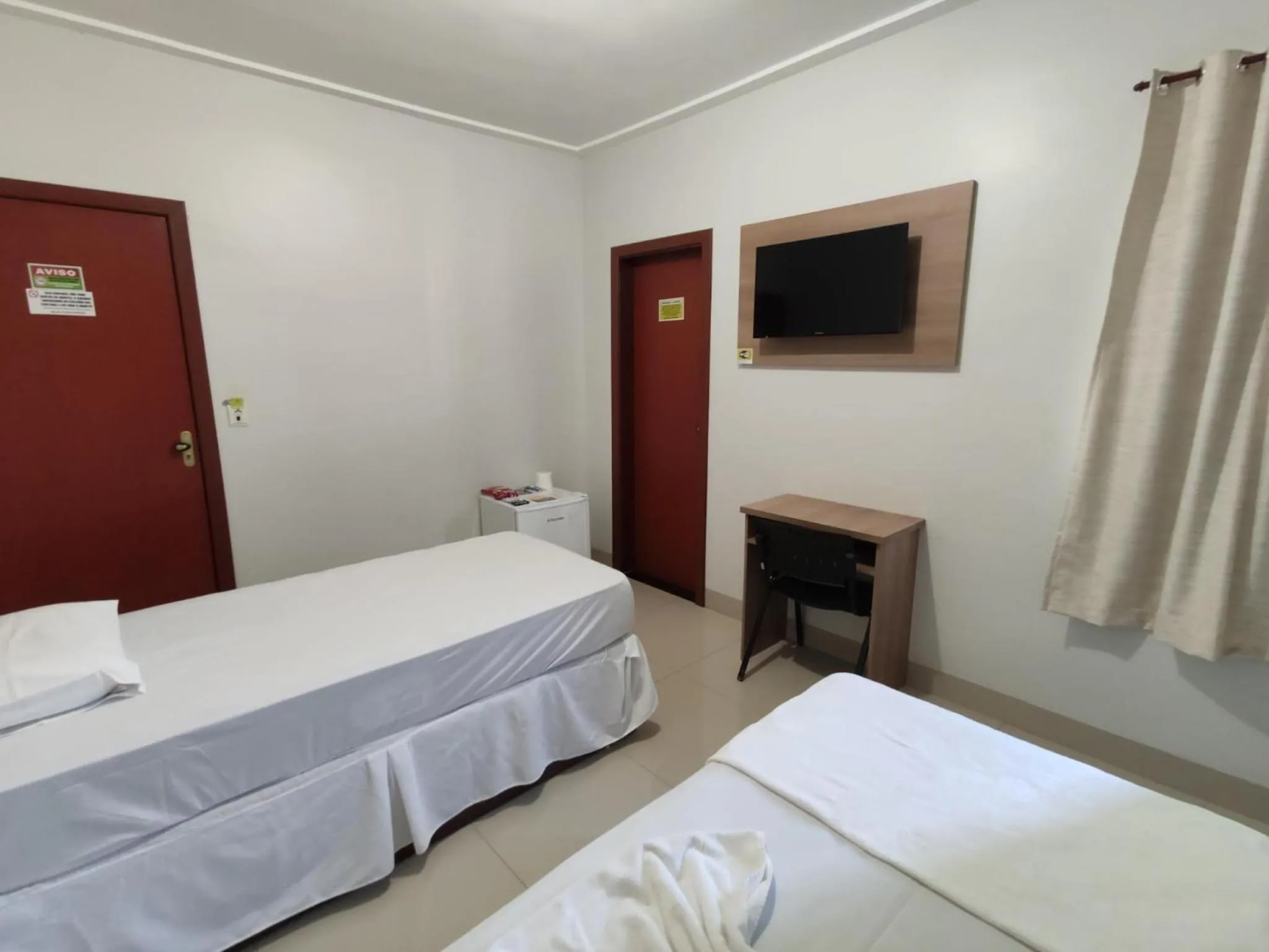 Communal lounge/ TV room, Bed in Cemarim Hotel