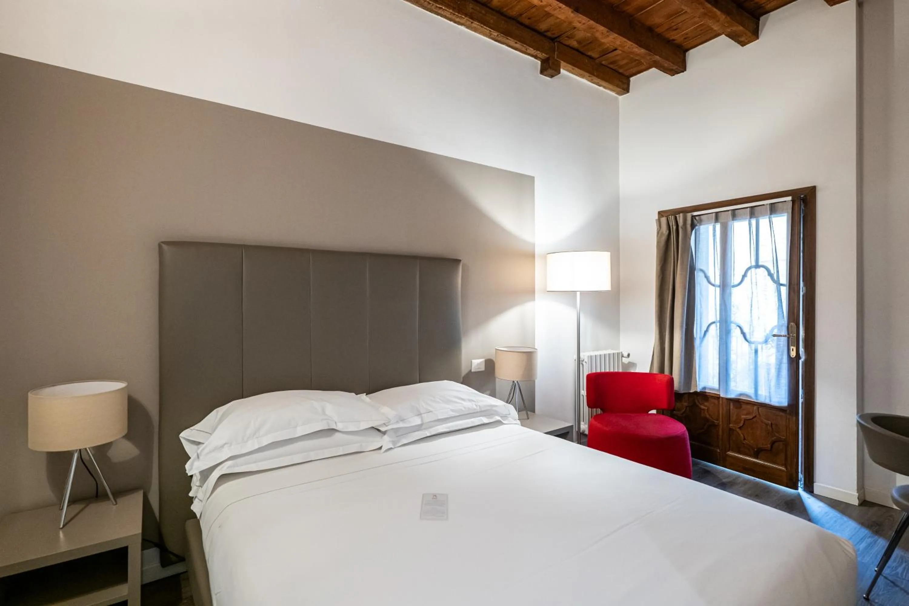 Bed in Ai Suma Hotel