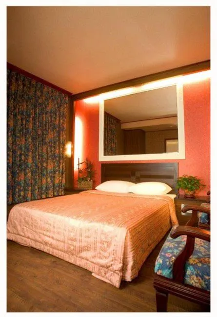 Bed in Hotel Lee-Chan