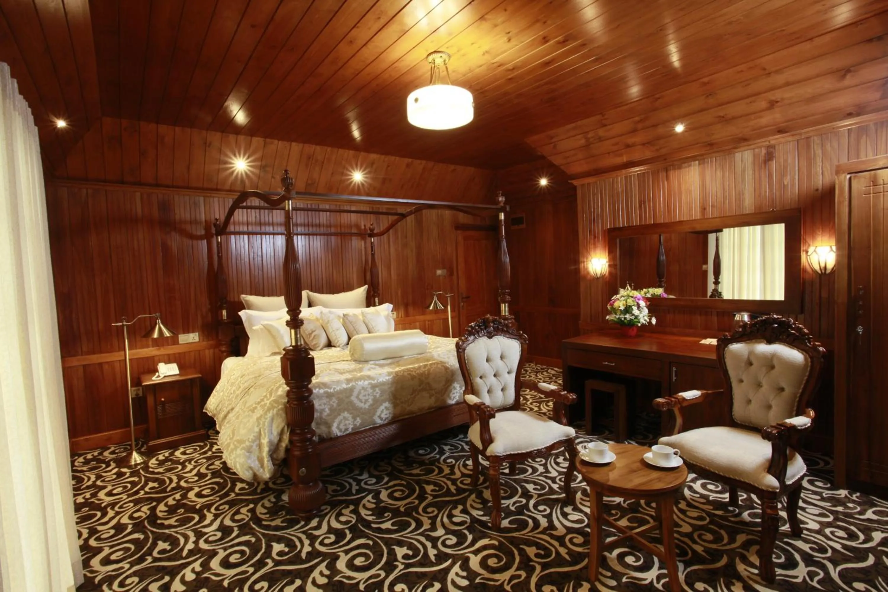 Seating area, Bed in La Grande Villa