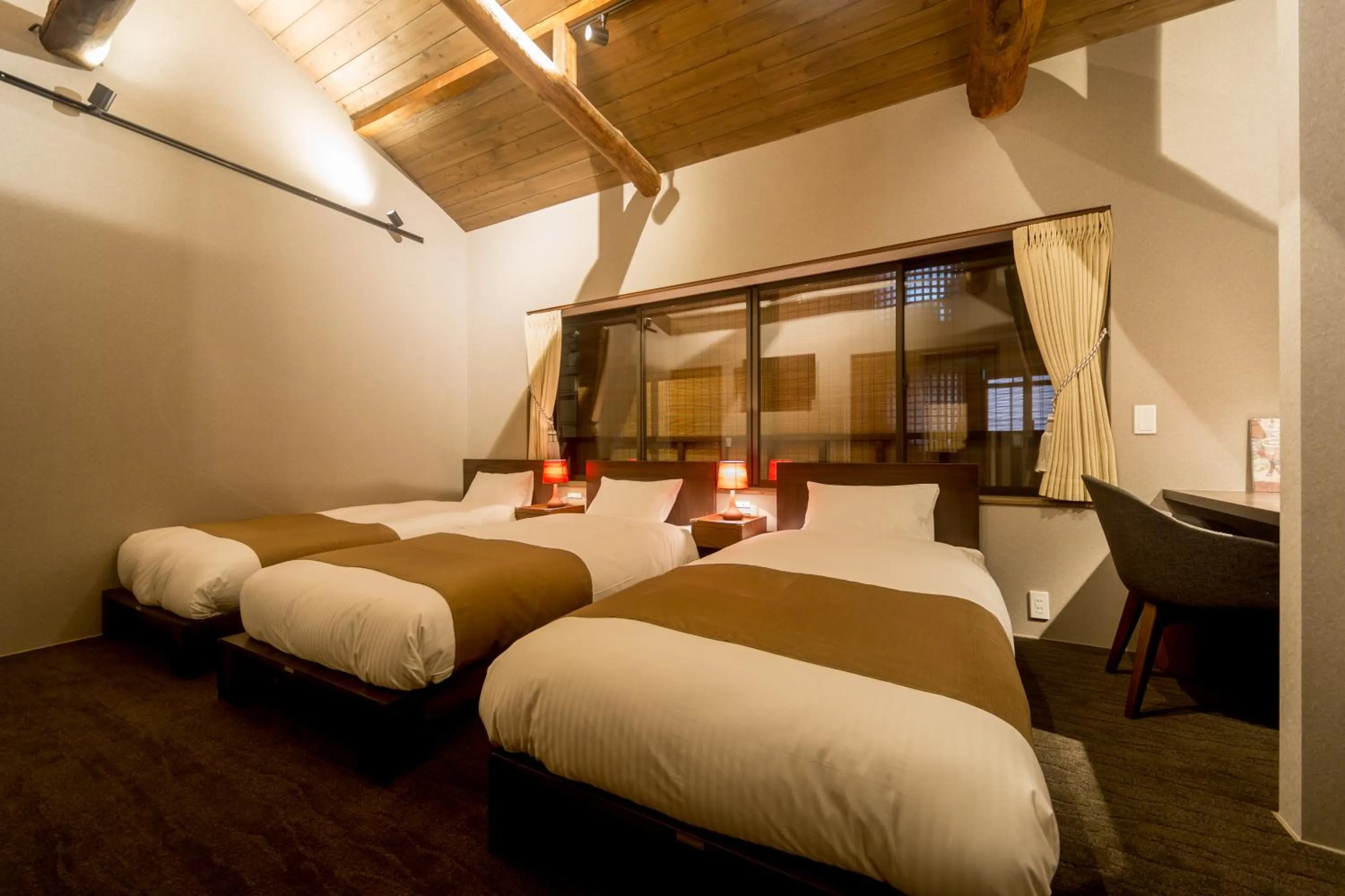 Bed in RESI STAY NISHIKI