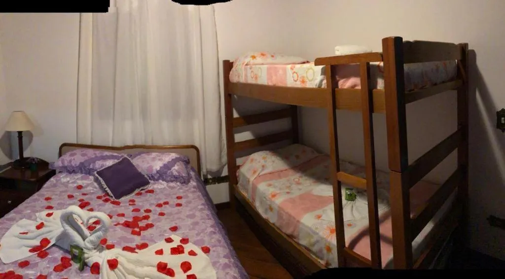 Bed in Chalé de Férias