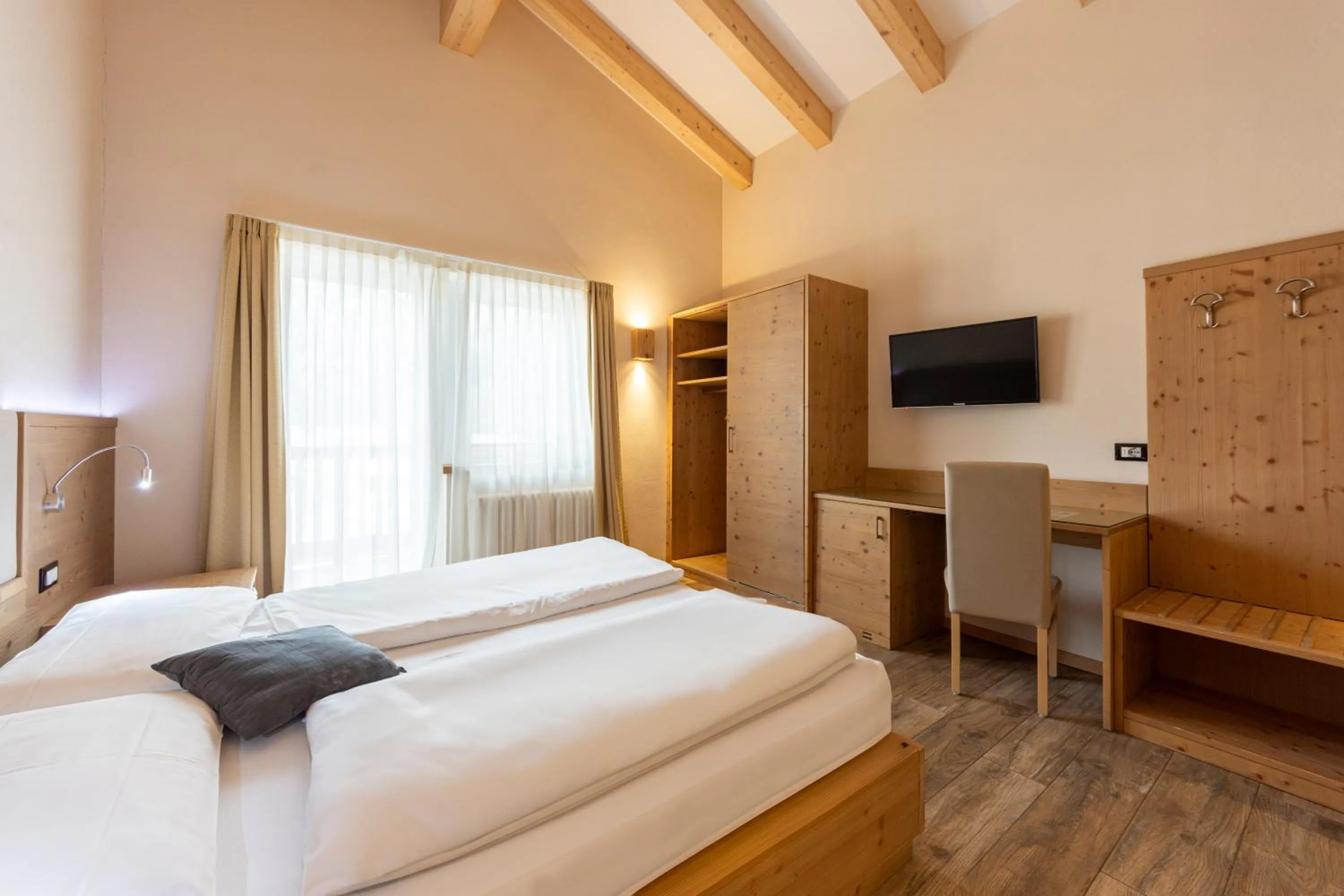 Bed in Park Hotel Avisio