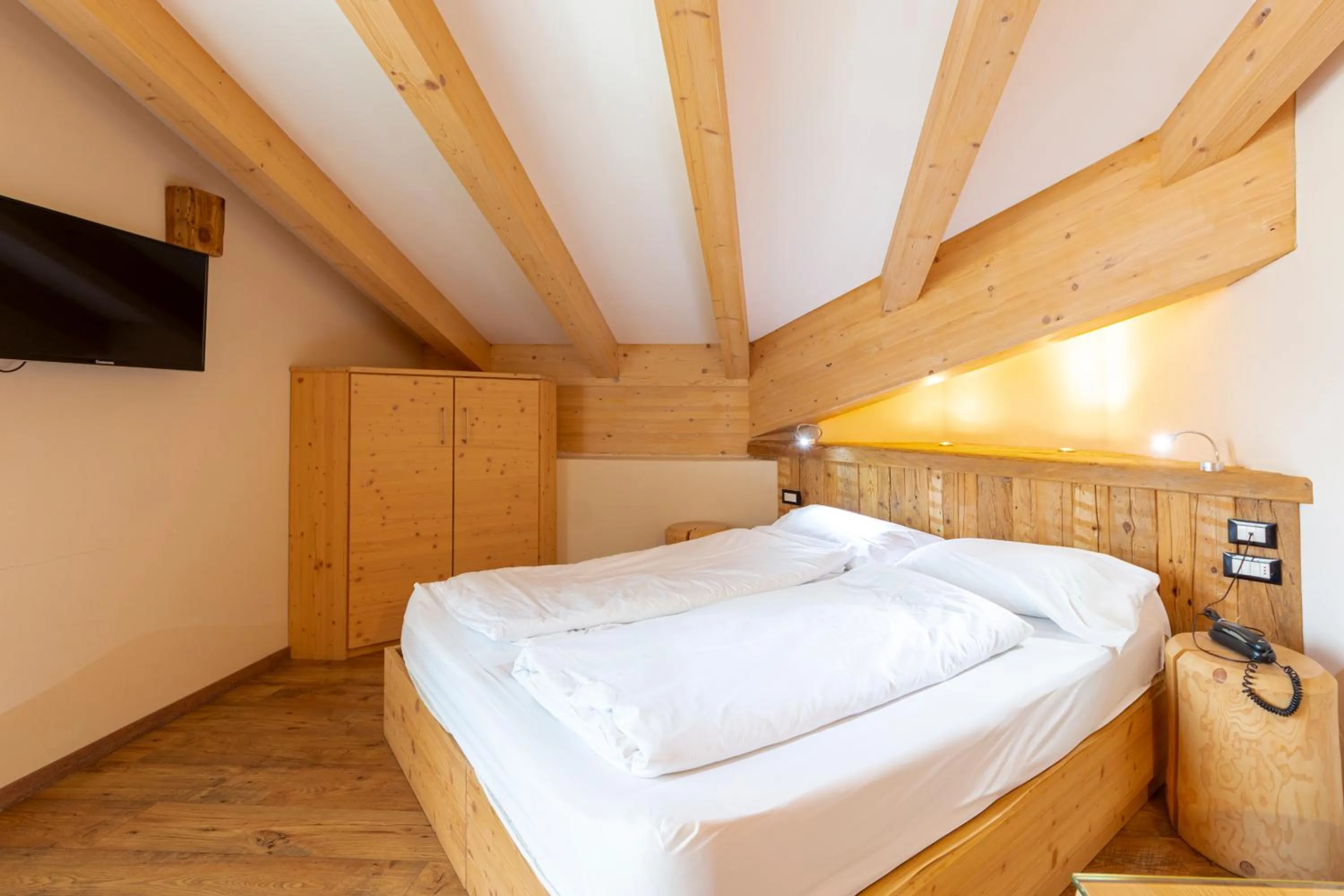 Bed in Park Hotel Avisio