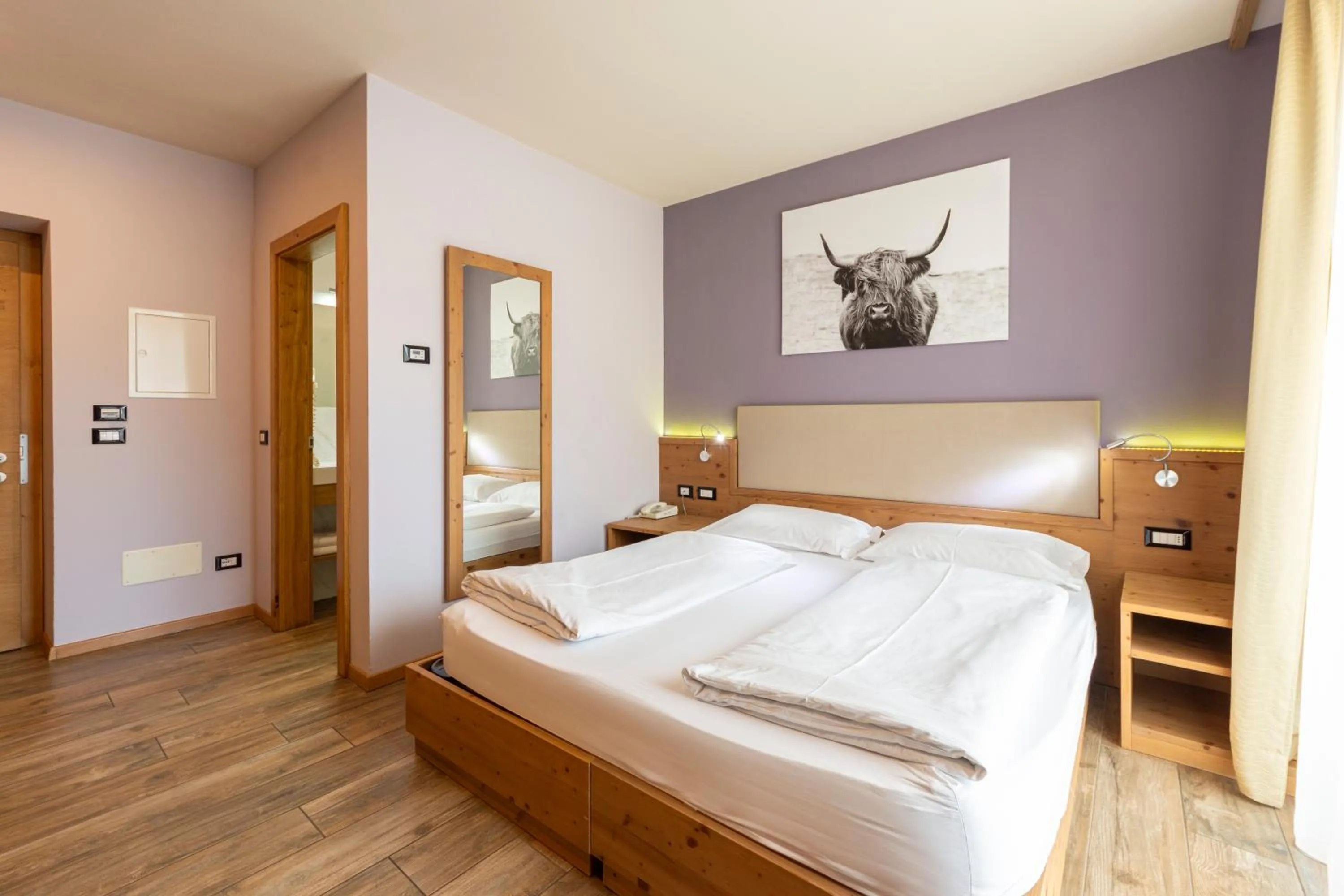 Bed in Park Hotel Avisio